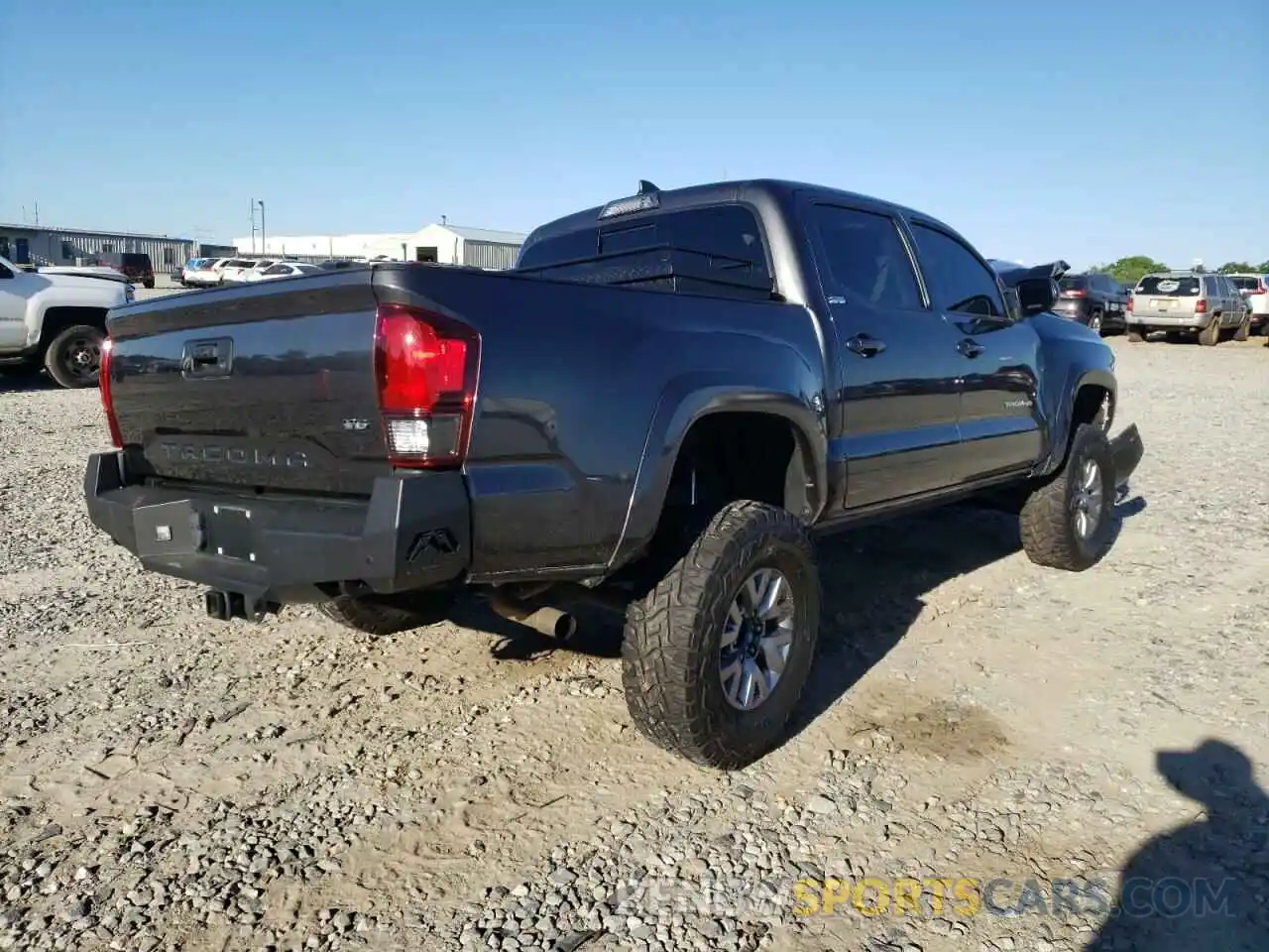 4 Photograph of a damaged car 3TMAZ5CN2KM107761 TOYOTA TACOMA 2019