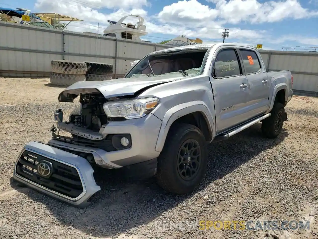 2 Photograph of a damaged car 3TMAZ5CN2KM107856 TOYOTA TACOMA 2019