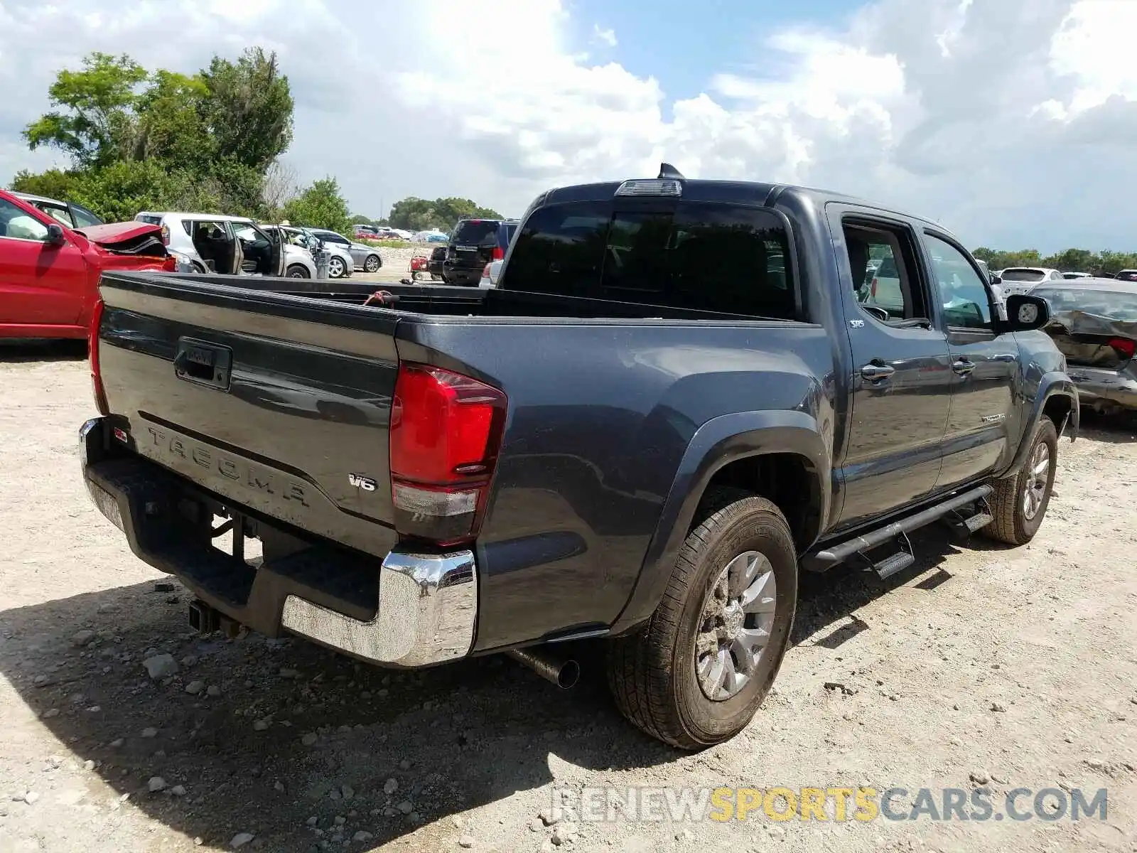 4 Photograph of a damaged car 3TMAZ5CN2KM108666 TOYOTA TACOMA 2019