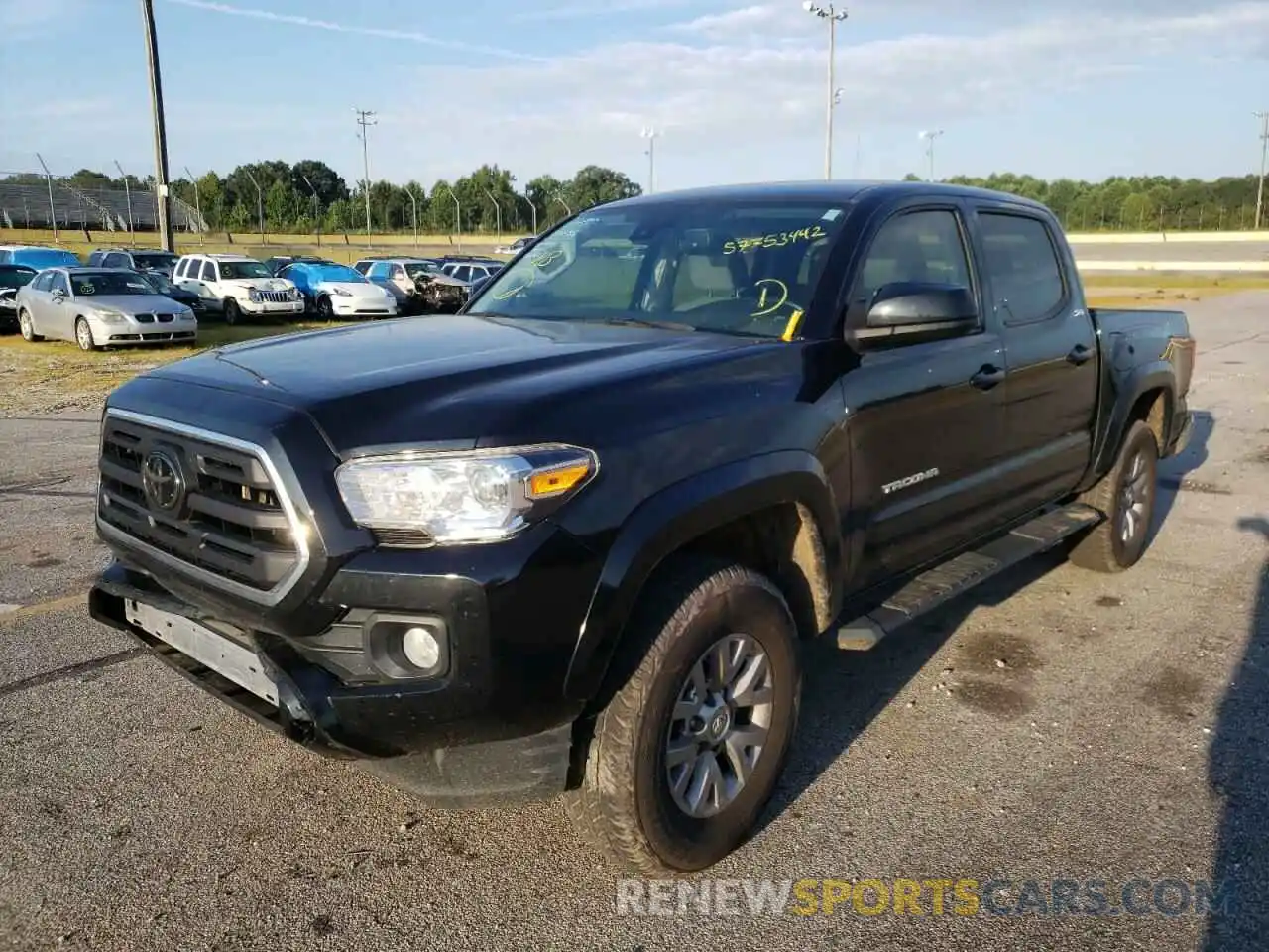 2 Photograph of a damaged car 3TMAZ5CN2KM109560 TOYOTA TACOMA 2019