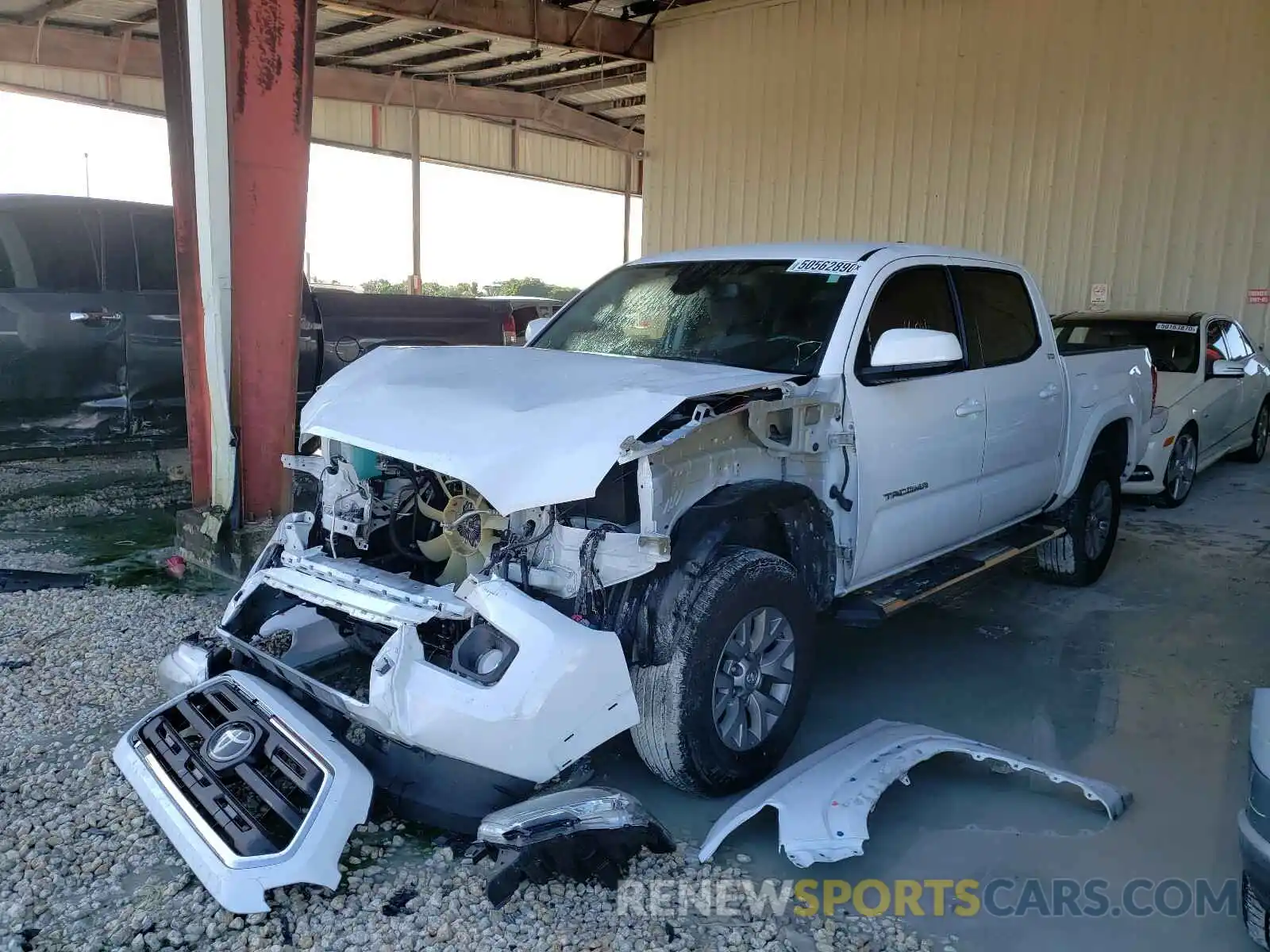 2 Photograph of a damaged car 3TMAZ5CN2KM110675 TOYOTA TACOMA 2019