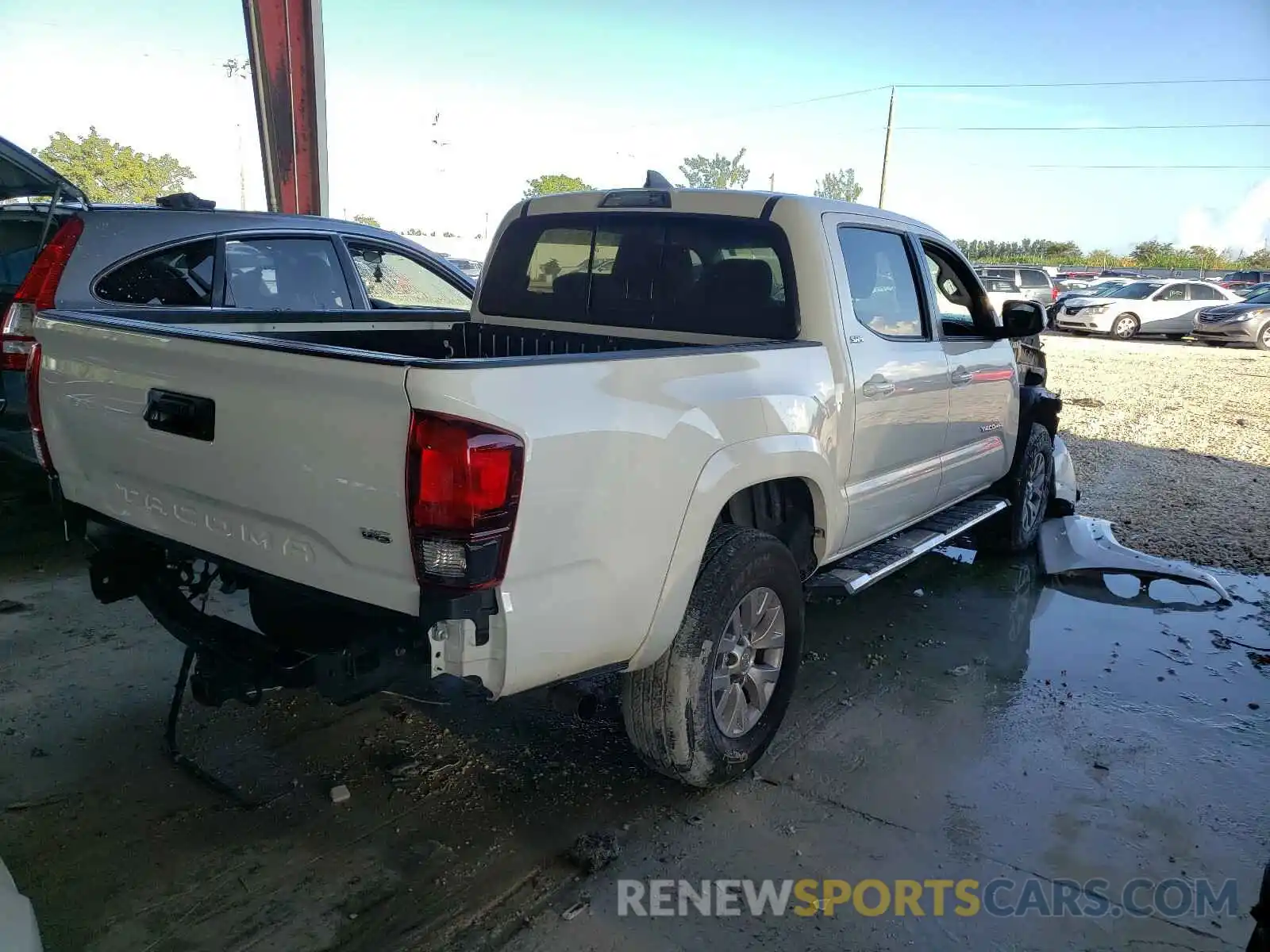 4 Photograph of a damaged car 3TMAZ5CN2KM110675 TOYOTA TACOMA 2019