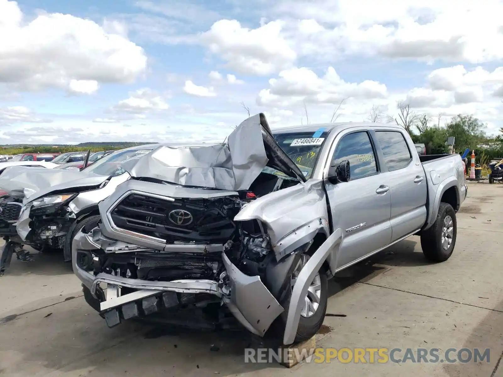 2 Photograph of a damaged car 3TMAZ5CN2KM112149 TOYOTA TACOMA 2019