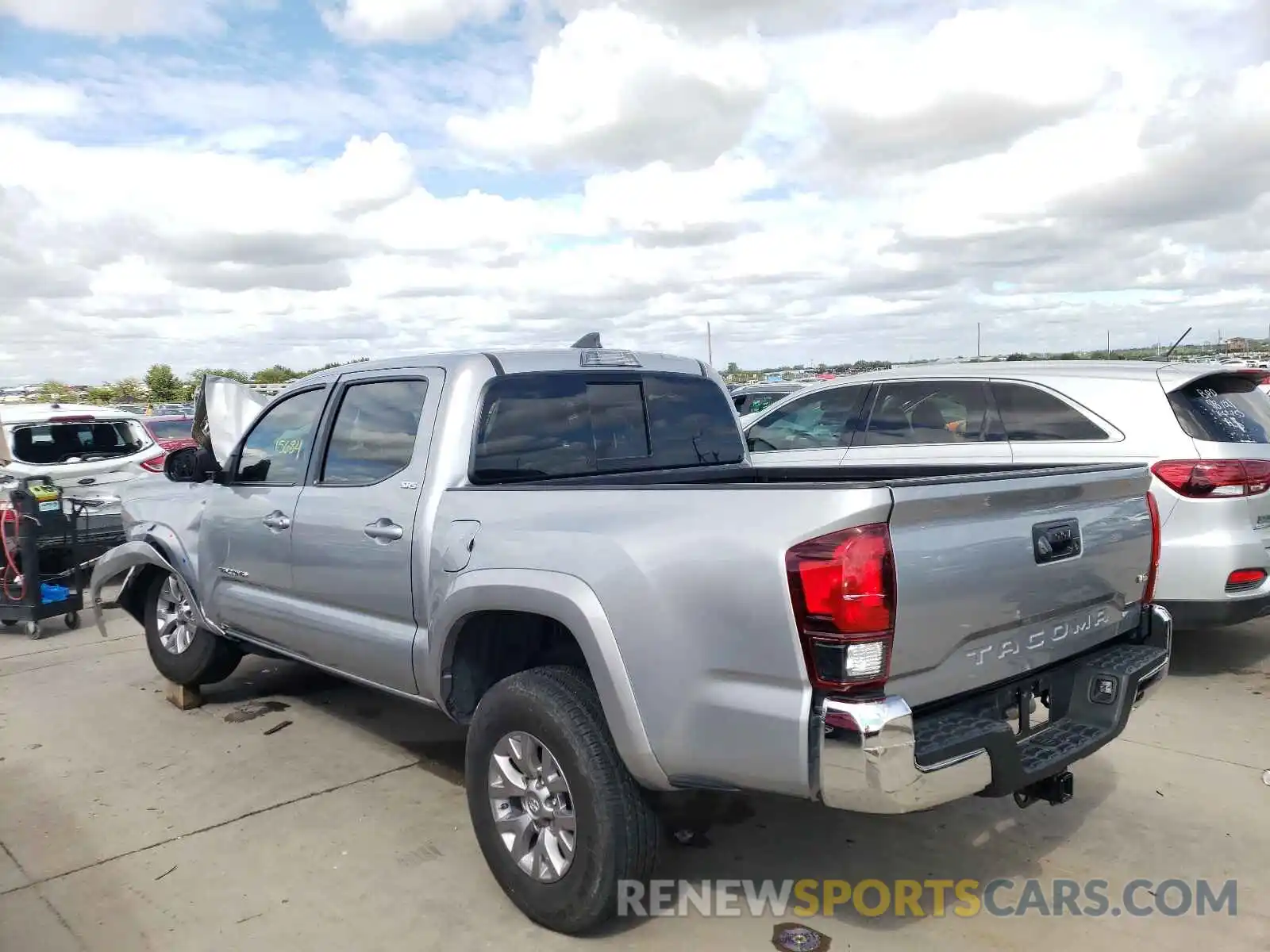 3 Photograph of a damaged car 3TMAZ5CN2KM112149 TOYOTA TACOMA 2019