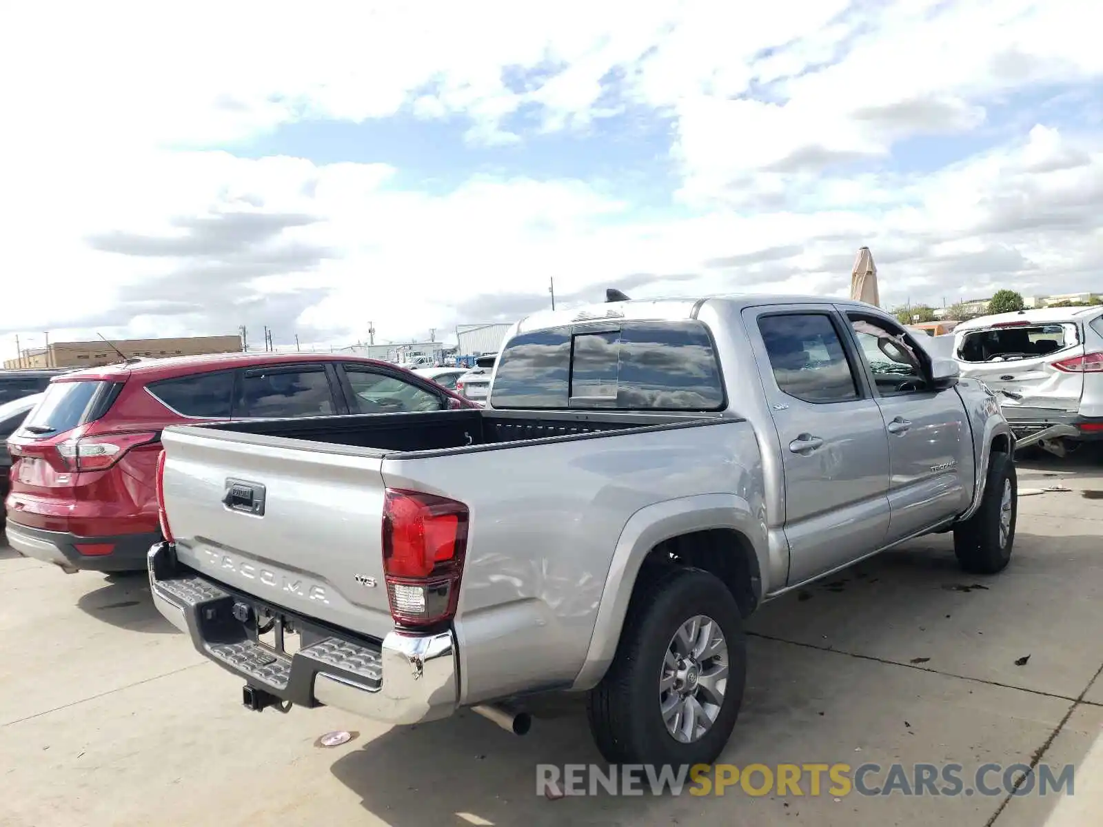 4 Photograph of a damaged car 3TMAZ5CN2KM112149 TOYOTA TACOMA 2019