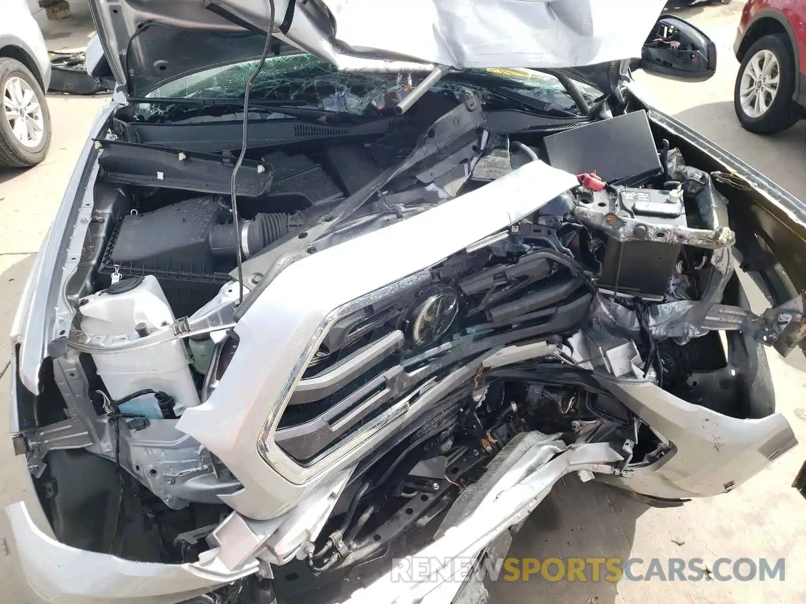 7 Photograph of a damaged car 3TMAZ5CN2KM112149 TOYOTA TACOMA 2019