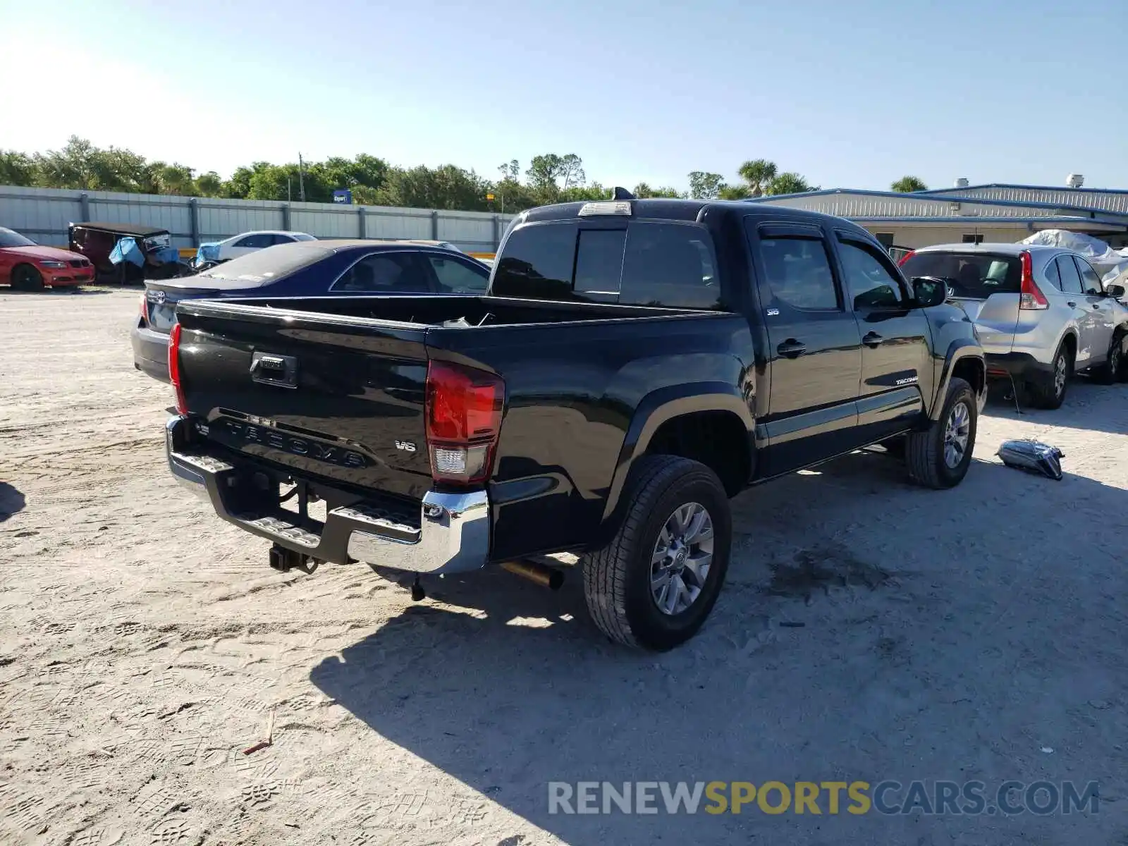 4 Photograph of a damaged car 3TMAZ5CN2KM112328 TOYOTA TACOMA 2019