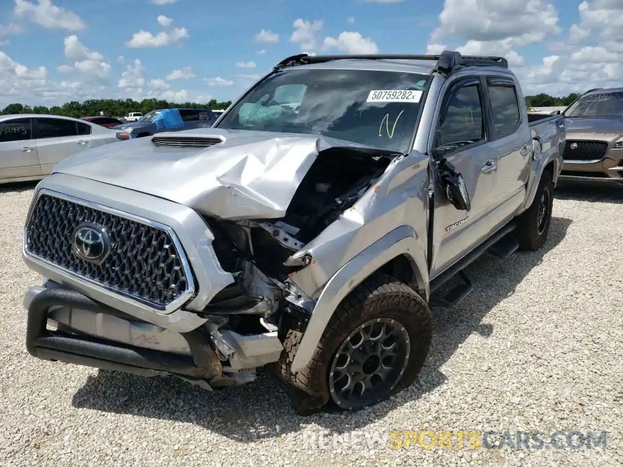 2 Photograph of a damaged car 3TMAZ5CN2KM113866 TOYOTA TACOMA 2019