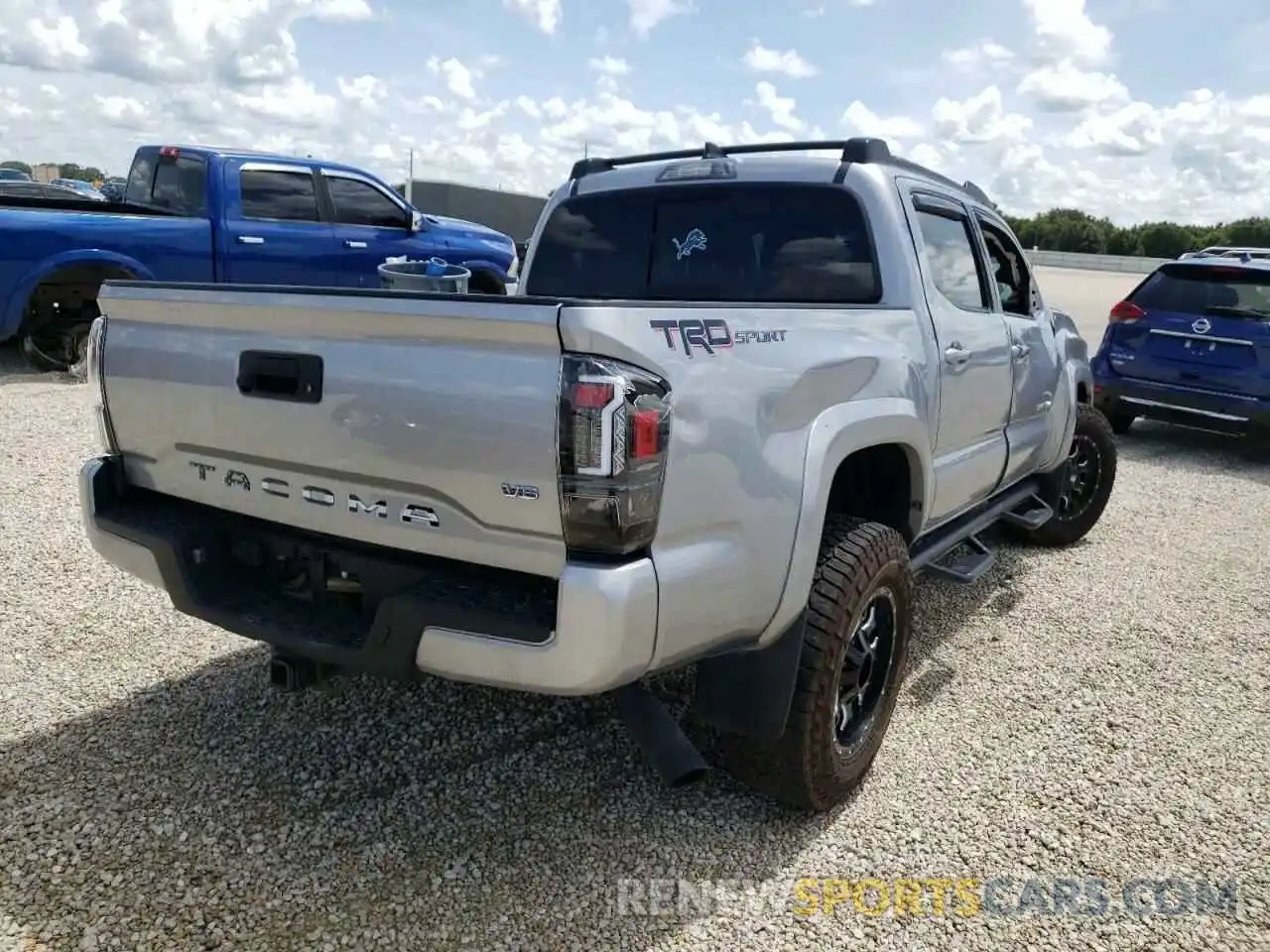 4 Photograph of a damaged car 3TMAZ5CN2KM113866 TOYOTA TACOMA 2019