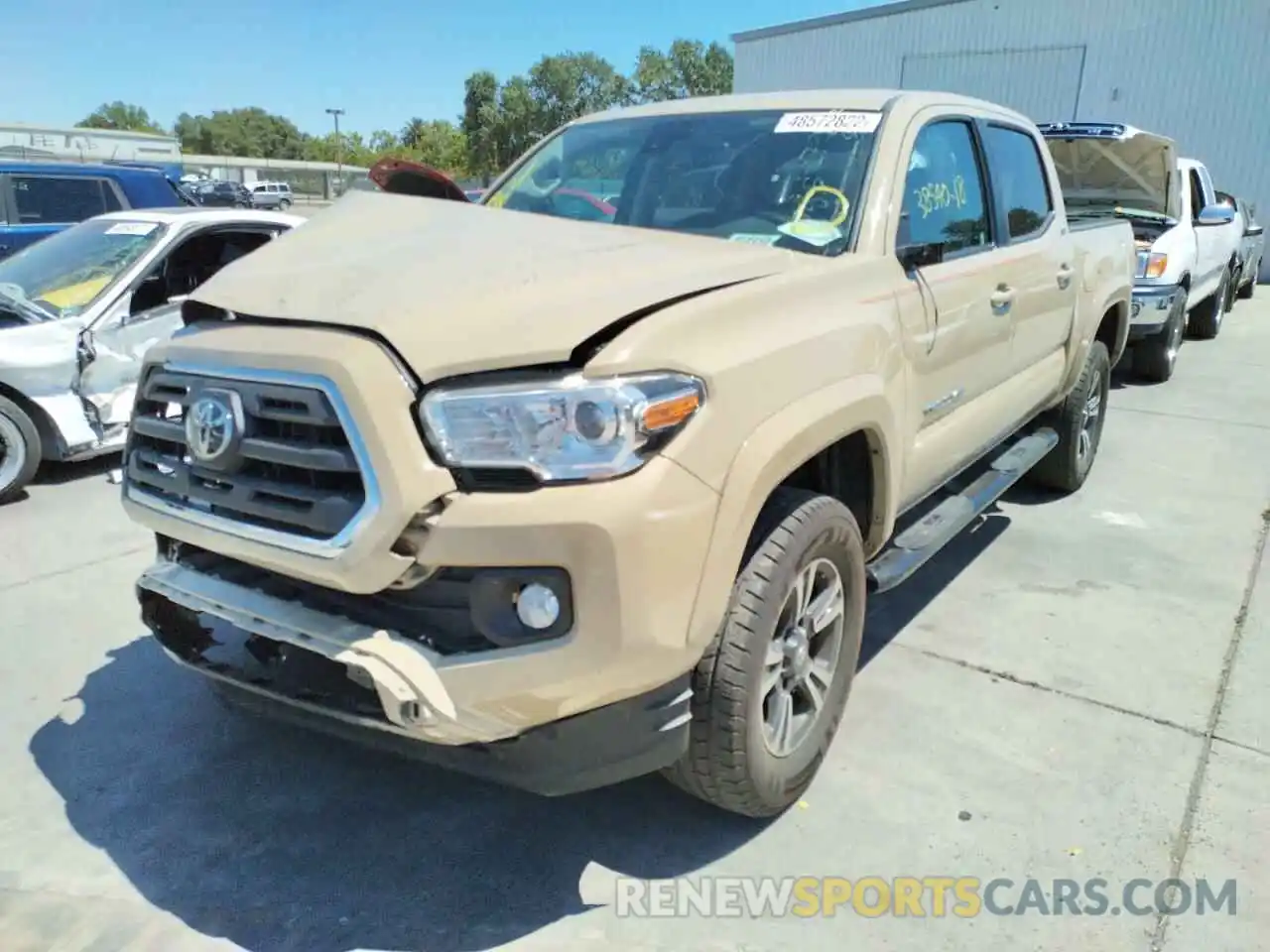 2 Photograph of a damaged car 3TMAZ5CN3KM081316 TOYOTA TACOMA 2019