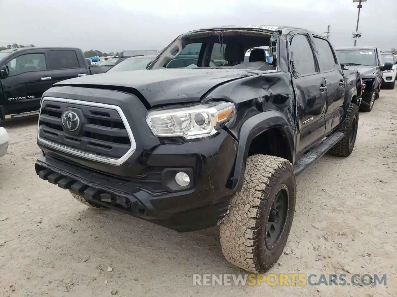 2 Photograph of a damaged car 3TMAZ5CN3KM082935 TOYOTA TACOMA 2019