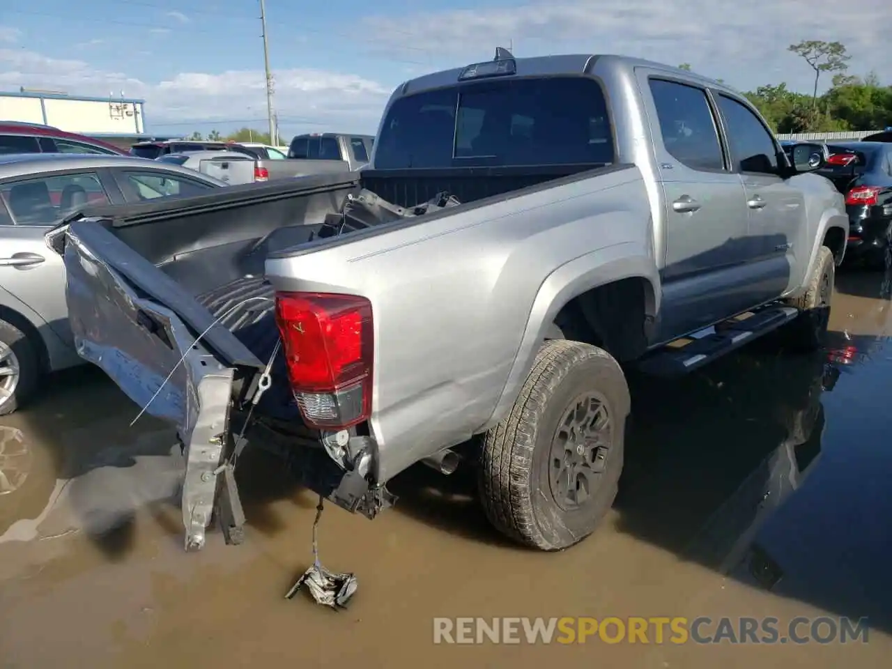 4 Photograph of a damaged car 3TMAZ5CN3KM083180 TOYOTA TACOMA 2019