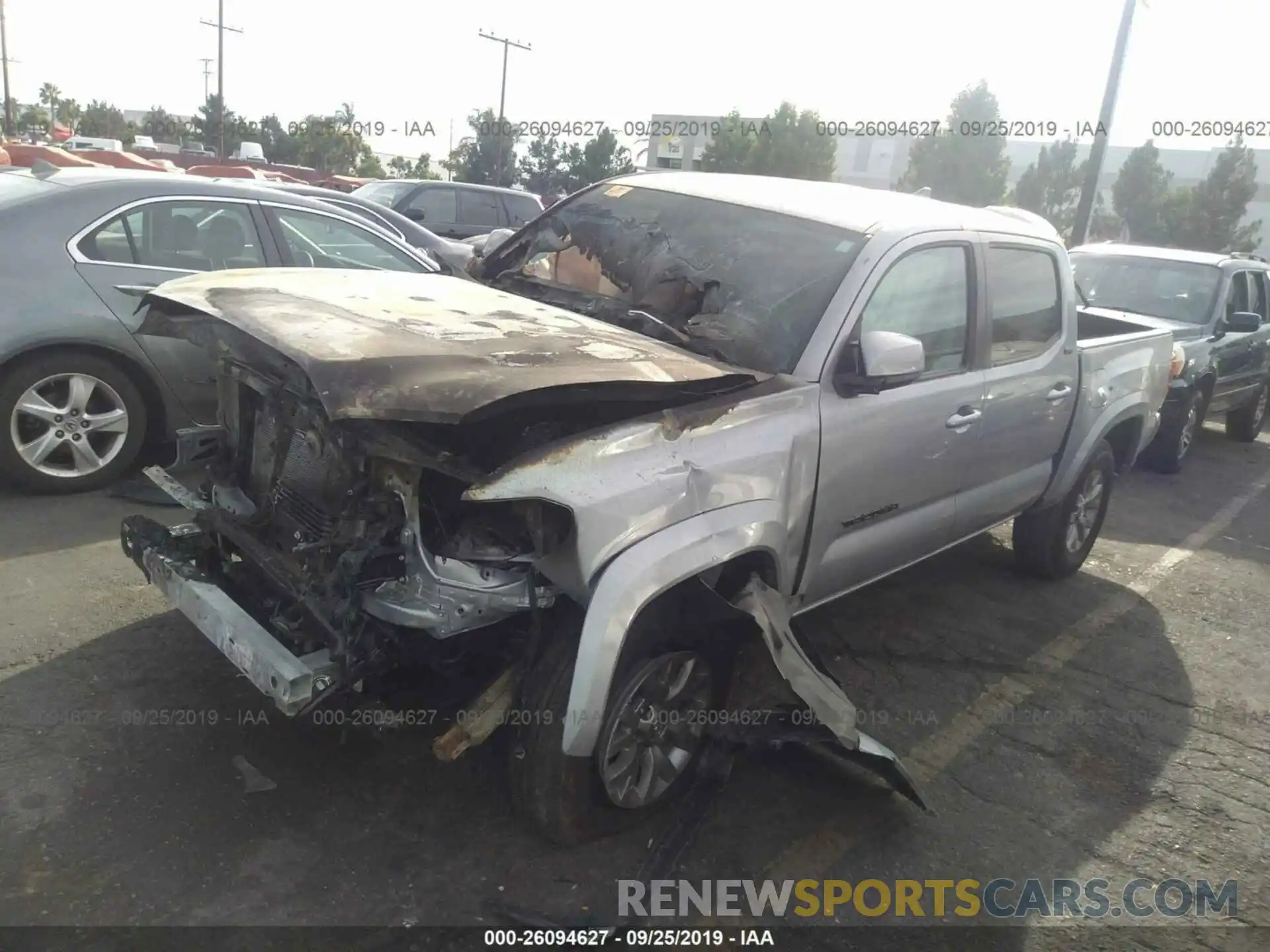 2 Photograph of a damaged car 3TMAZ5CN3KM083910 TOYOTA TACOMA 2019