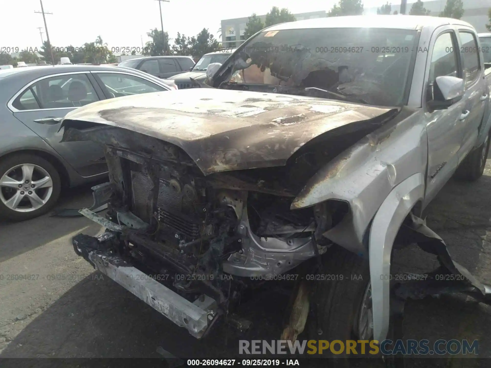 6 Photograph of a damaged car 3TMAZ5CN3KM083910 TOYOTA TACOMA 2019