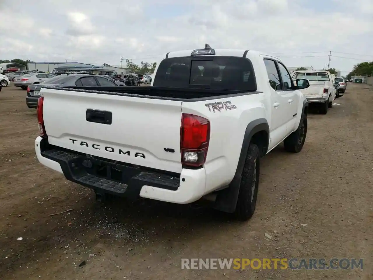 4 Photograph of a damaged car 3TMAZ5CN3KM089691 TOYOTA TACOMA 2019