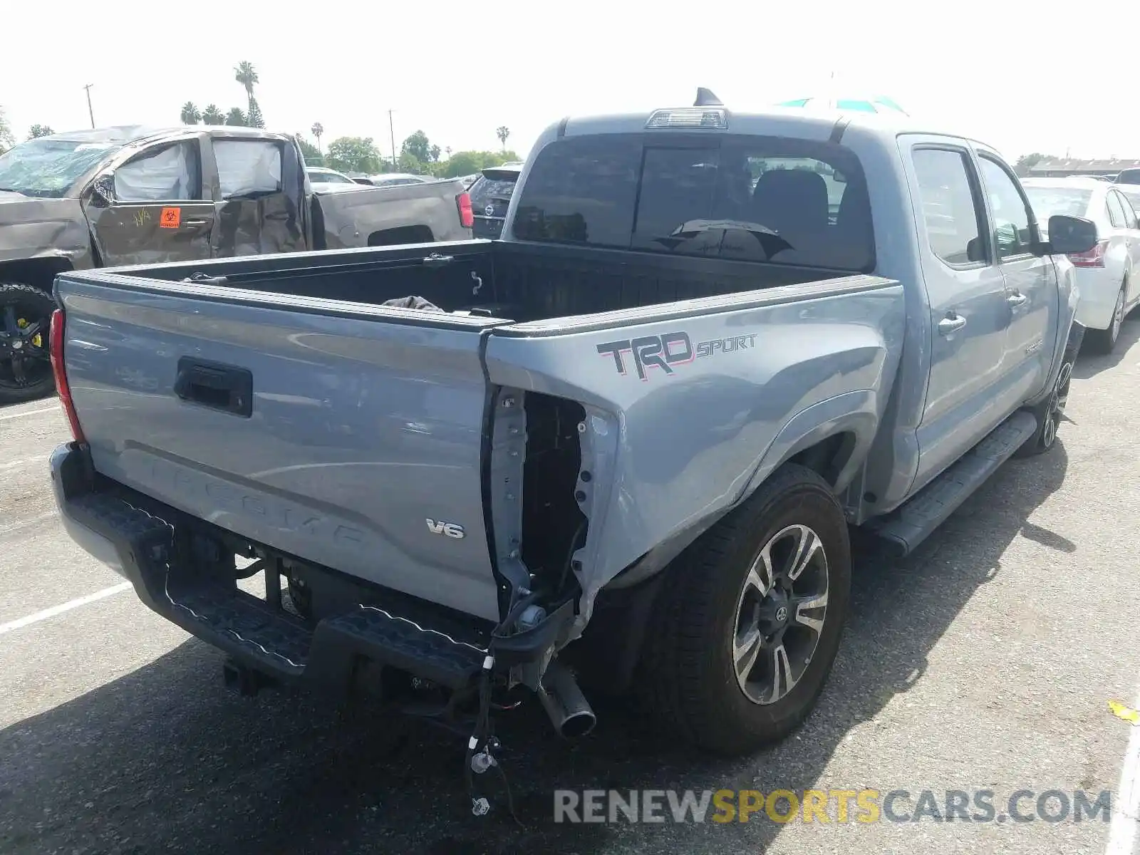 4 Photograph of a damaged car 3TMAZ5CN3KM097337 TOYOTA TACOMA 2019