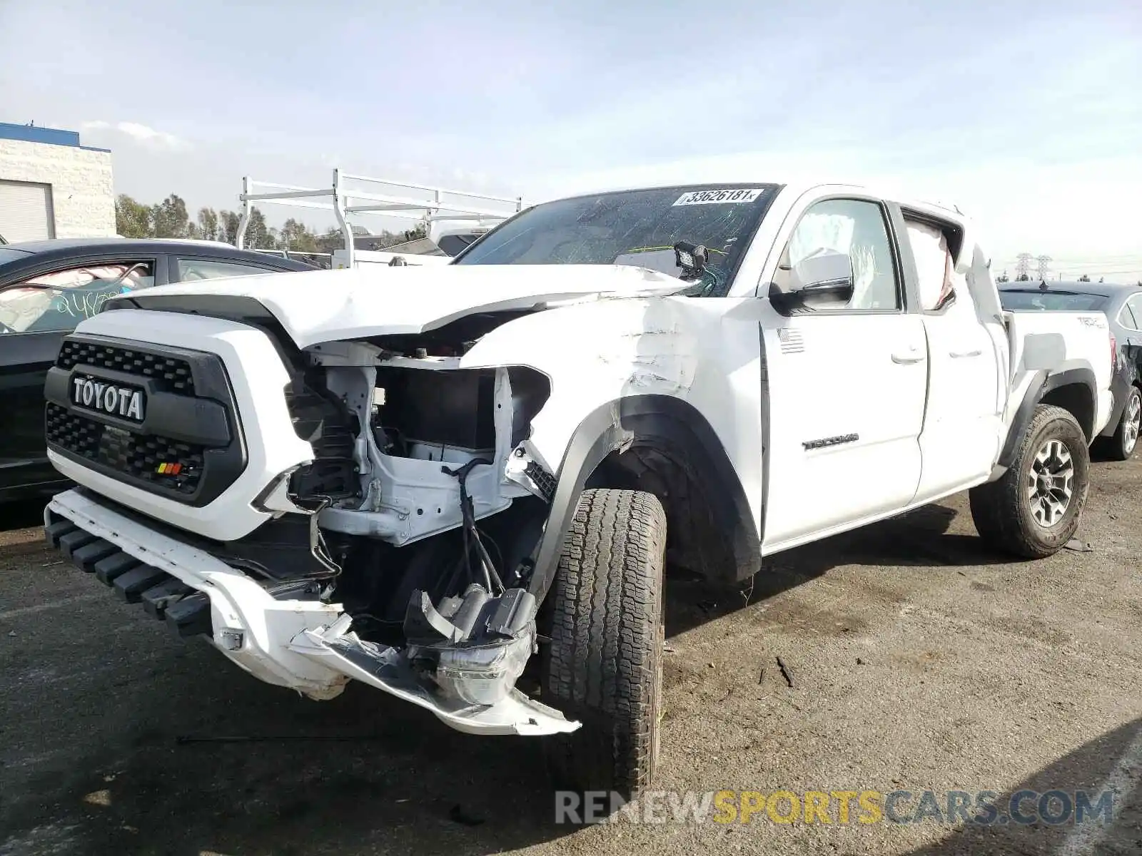 2 Photograph of a damaged car 3TMAZ5CN3KM097662 TOYOTA TACOMA 2019