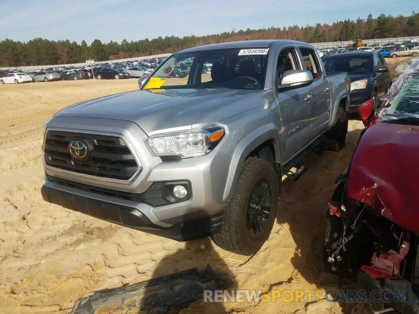 2 Photograph of a damaged car 3TMAZ5CN3KM100639 TOYOTA TACOMA 2019