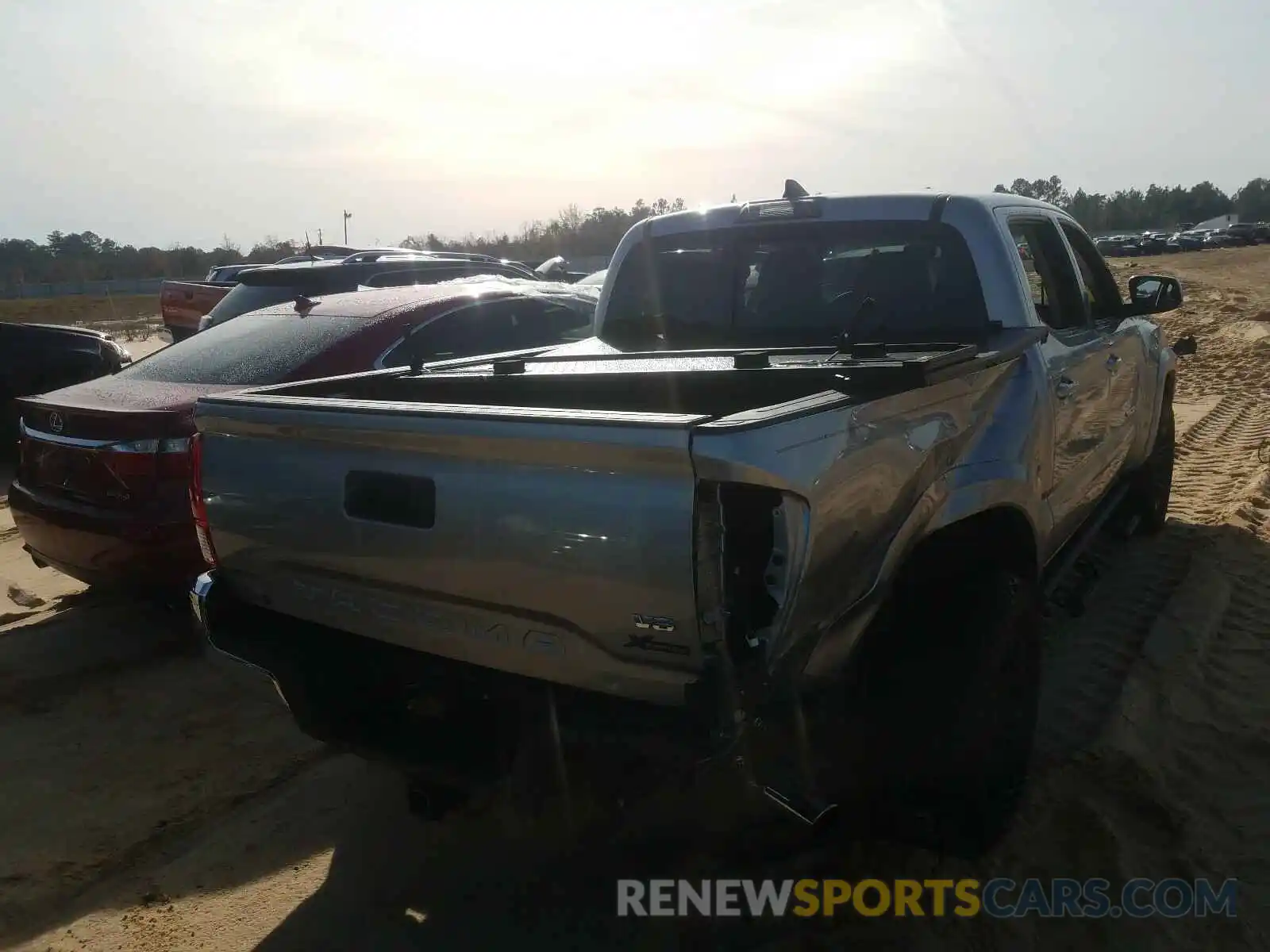 4 Photograph of a damaged car 3TMAZ5CN3KM100639 TOYOTA TACOMA 2019