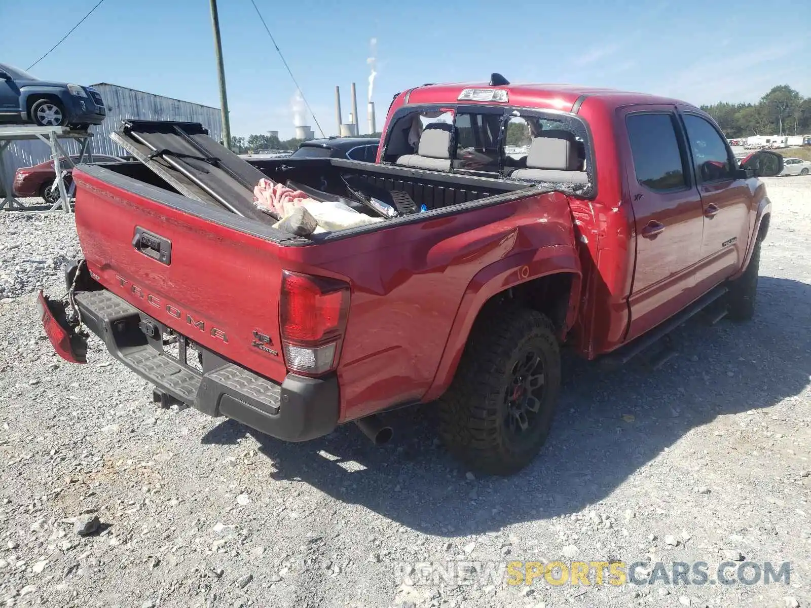 4 Photograph of a damaged car 3TMAZ5CN3KM101791 TOYOTA TACOMA 2019