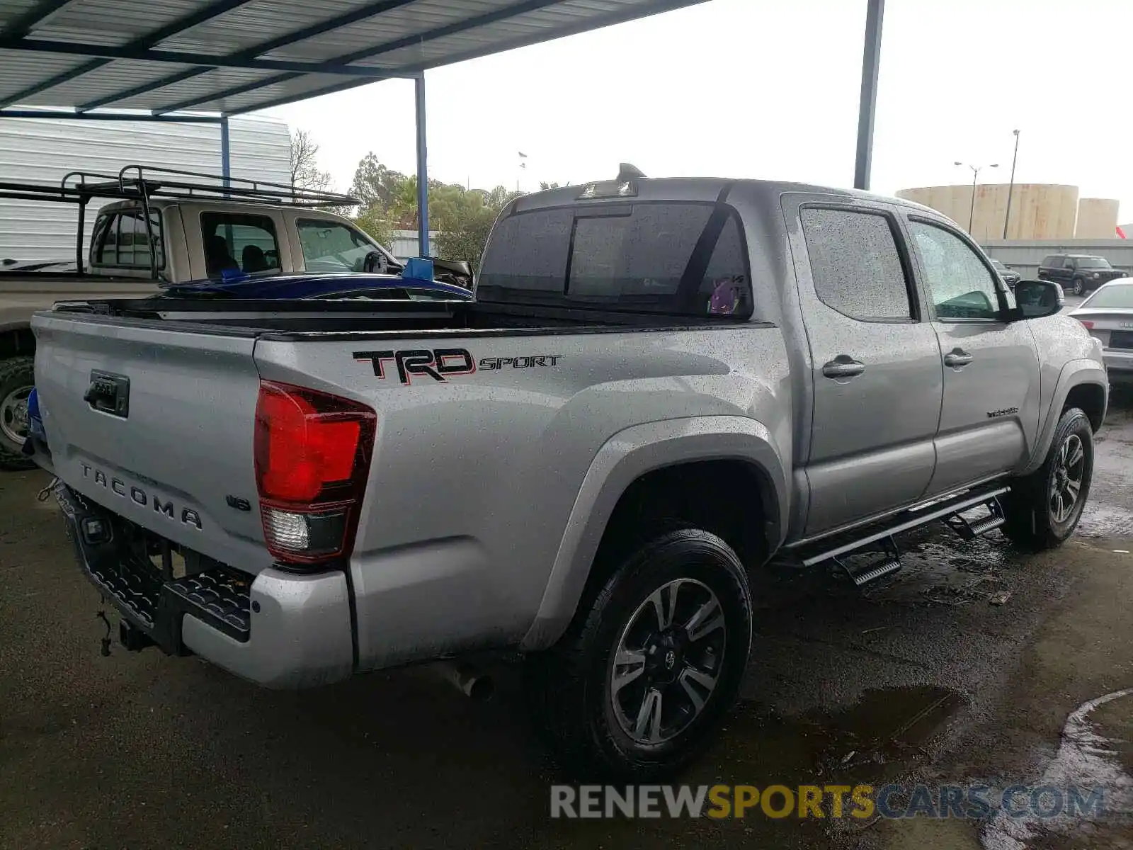 4 Photograph of a damaged car 3TMAZ5CN3KM102679 TOYOTA TACOMA 2019