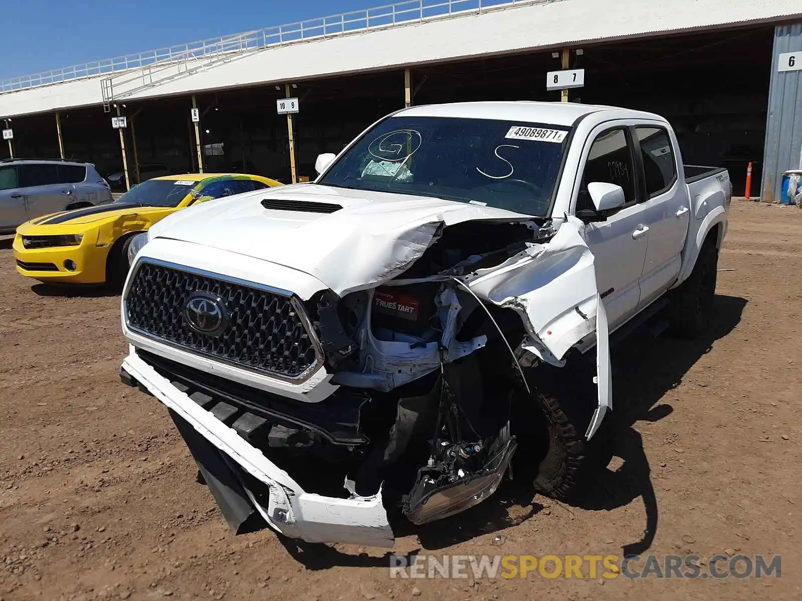 2 Photograph of a damaged car 3TMAZ5CN3KM103248 TOYOTA TACOMA 2019