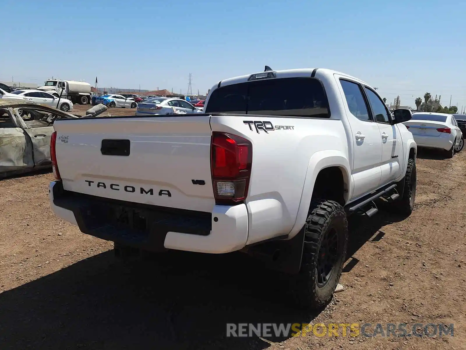 4 Photograph of a damaged car 3TMAZ5CN3KM103248 TOYOTA TACOMA 2019