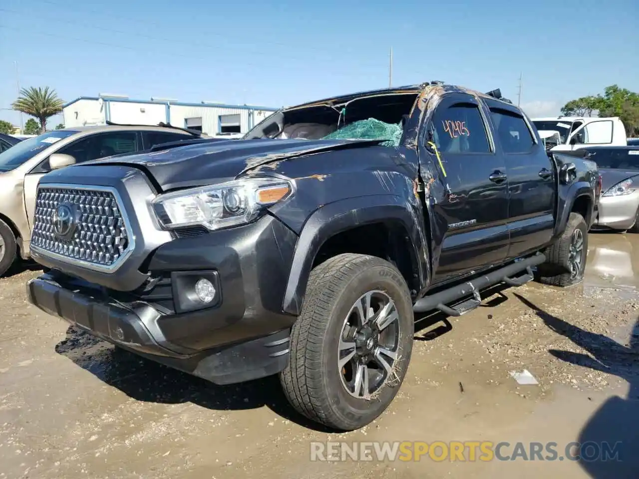 2 Photograph of a damaged car 3TMAZ5CN3KM106859 TOYOTA TACOMA 2019