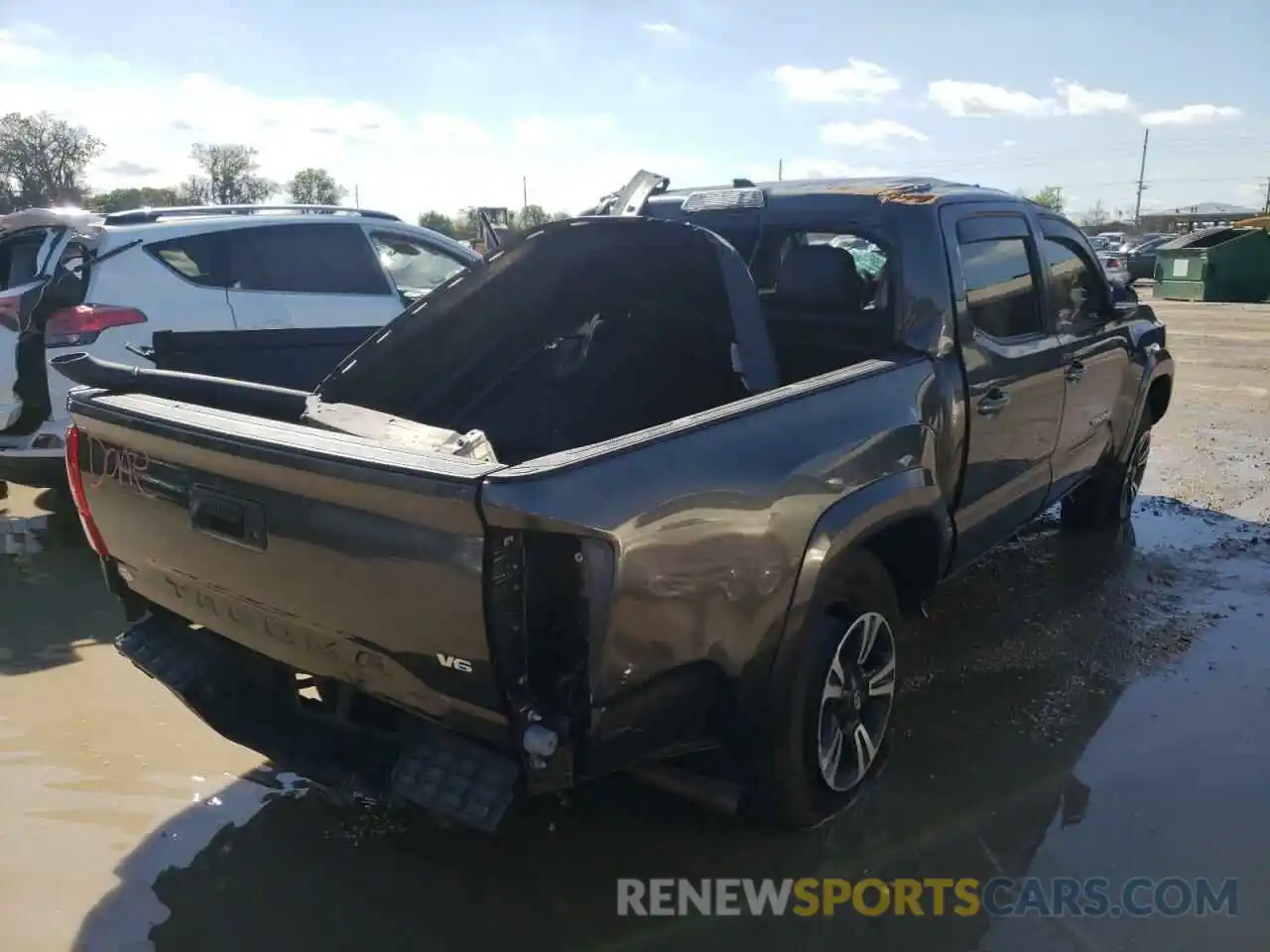 4 Photograph of a damaged car 3TMAZ5CN3KM106859 TOYOTA TACOMA 2019