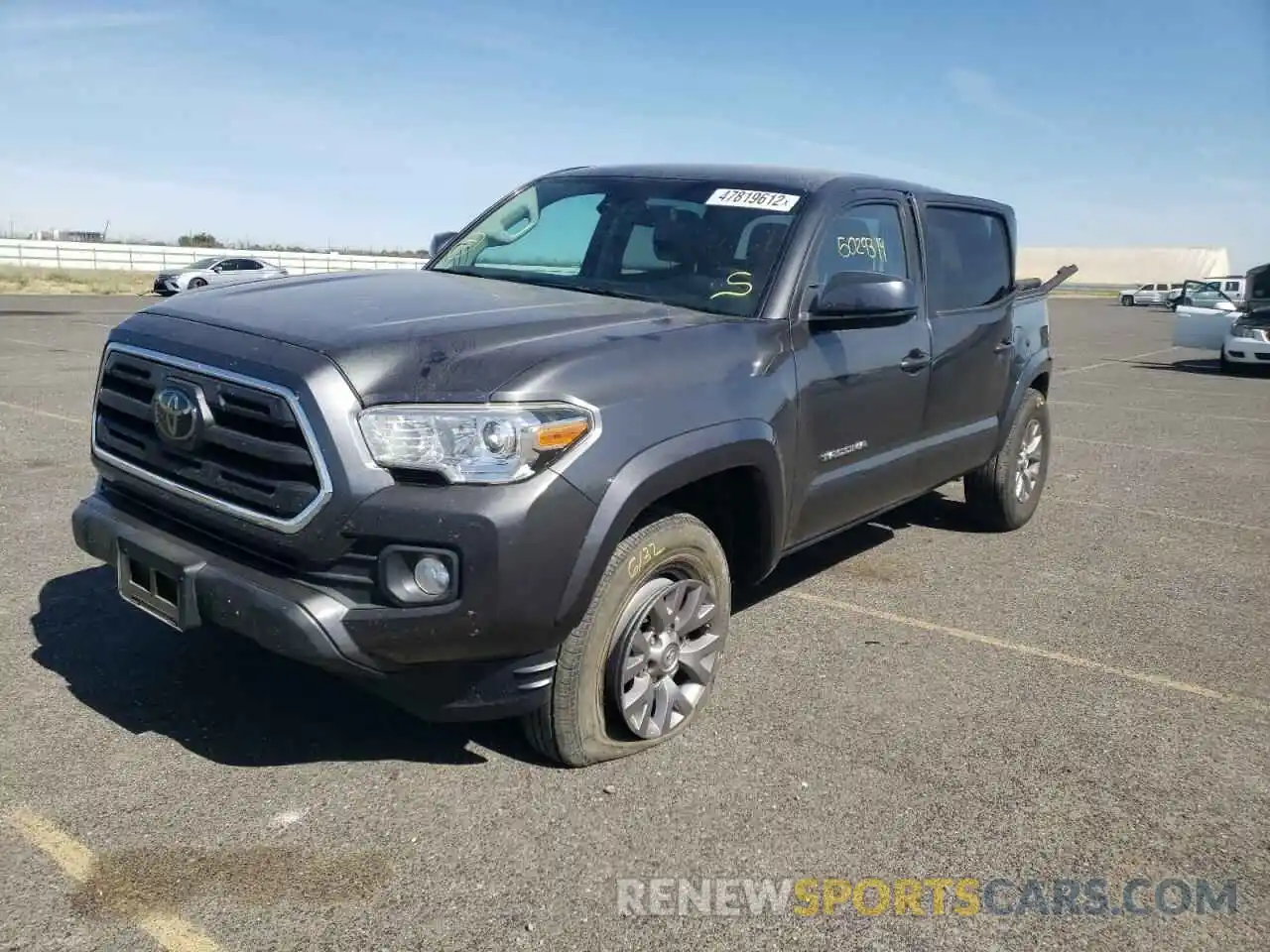 2 Photograph of a damaged car 3TMAZ5CN3KM107039 TOYOTA TACOMA 2019