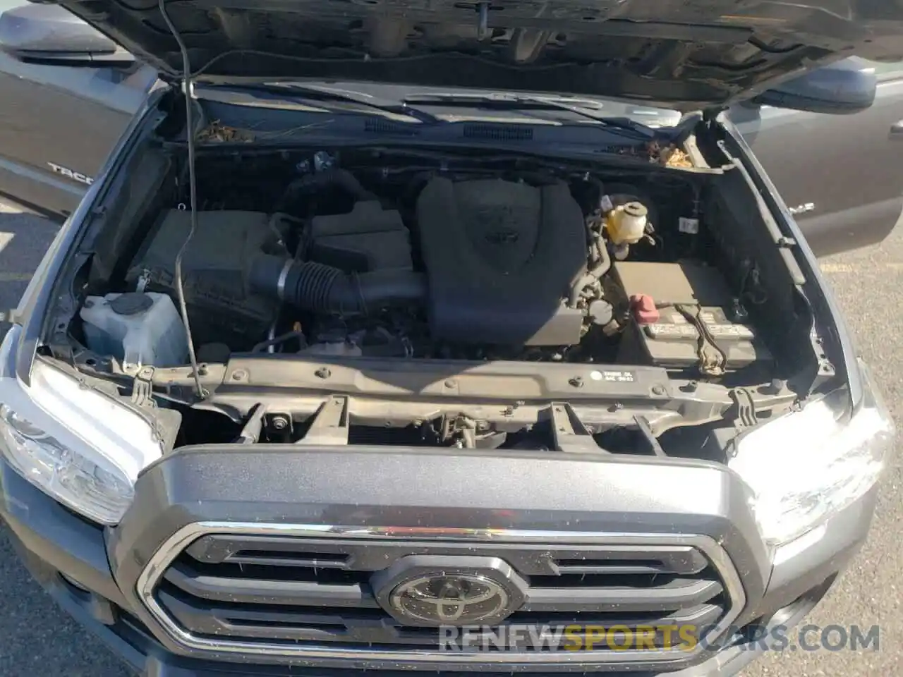 7 Photograph of a damaged car 3TMAZ5CN3KM107039 TOYOTA TACOMA 2019