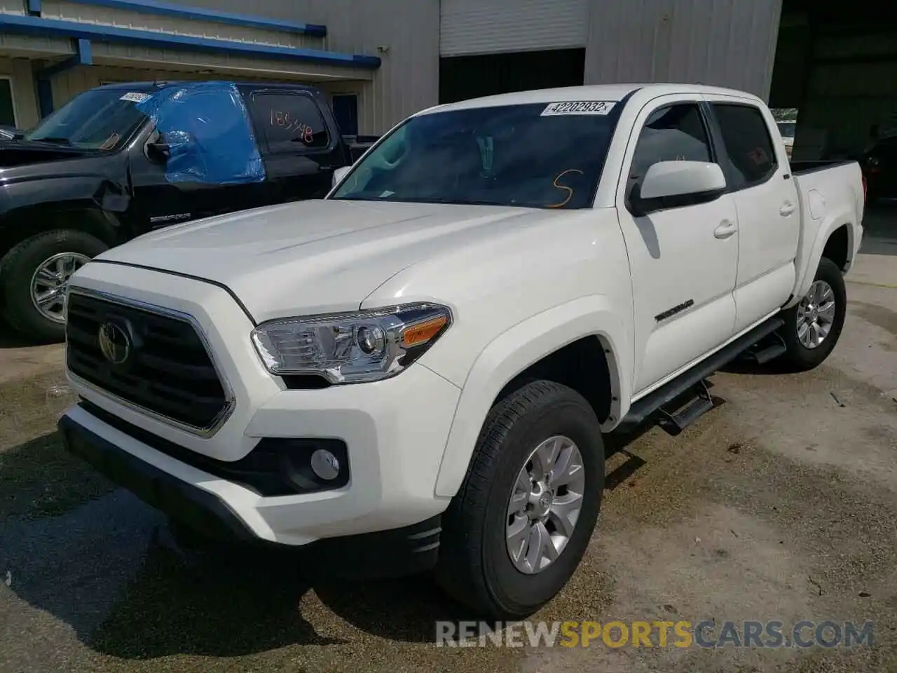 2 Photograph of a damaged car 3TMAZ5CN3KM108465 TOYOTA TACOMA 2019