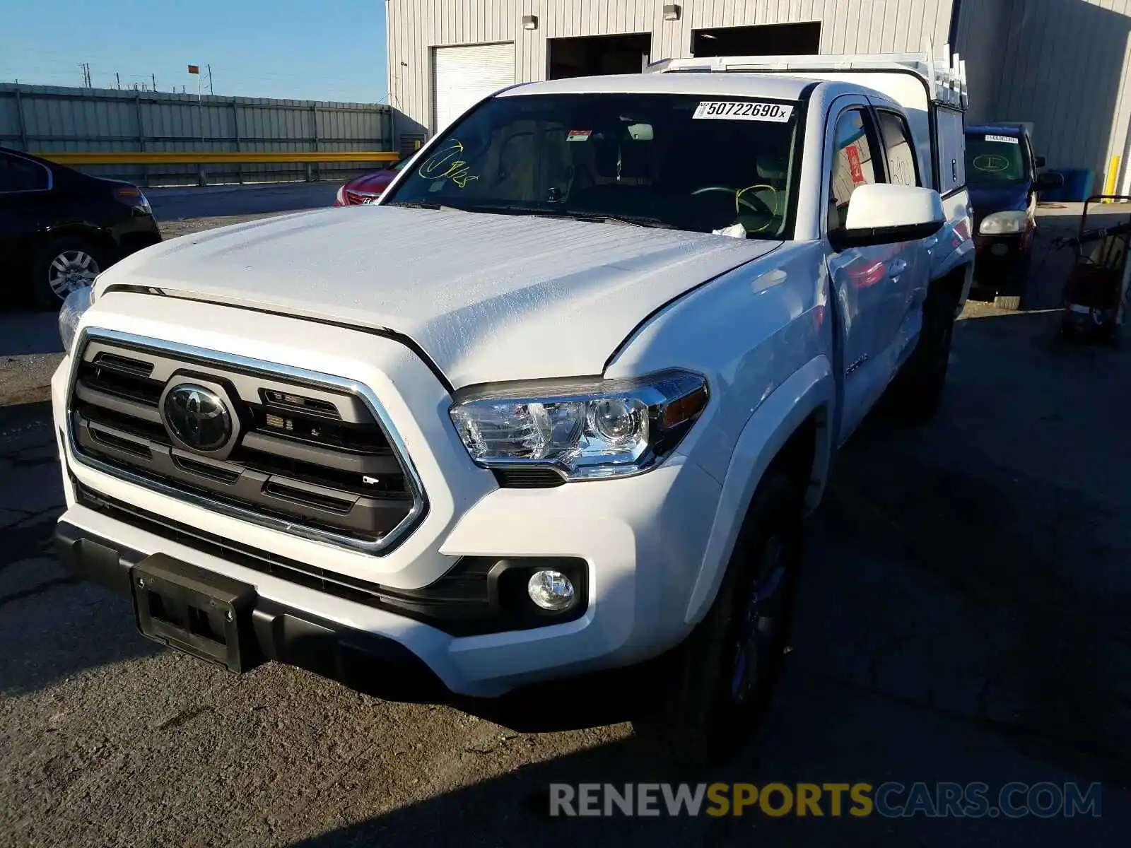 2 Photograph of a damaged car 3TMAZ5CN3KM110829 TOYOTA TACOMA 2019