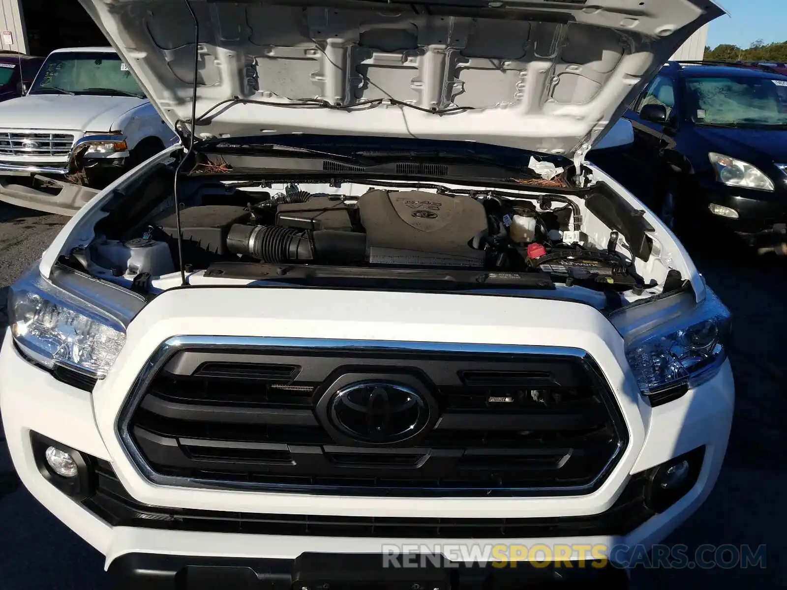 7 Photograph of a damaged car 3TMAZ5CN3KM110829 TOYOTA TACOMA 2019