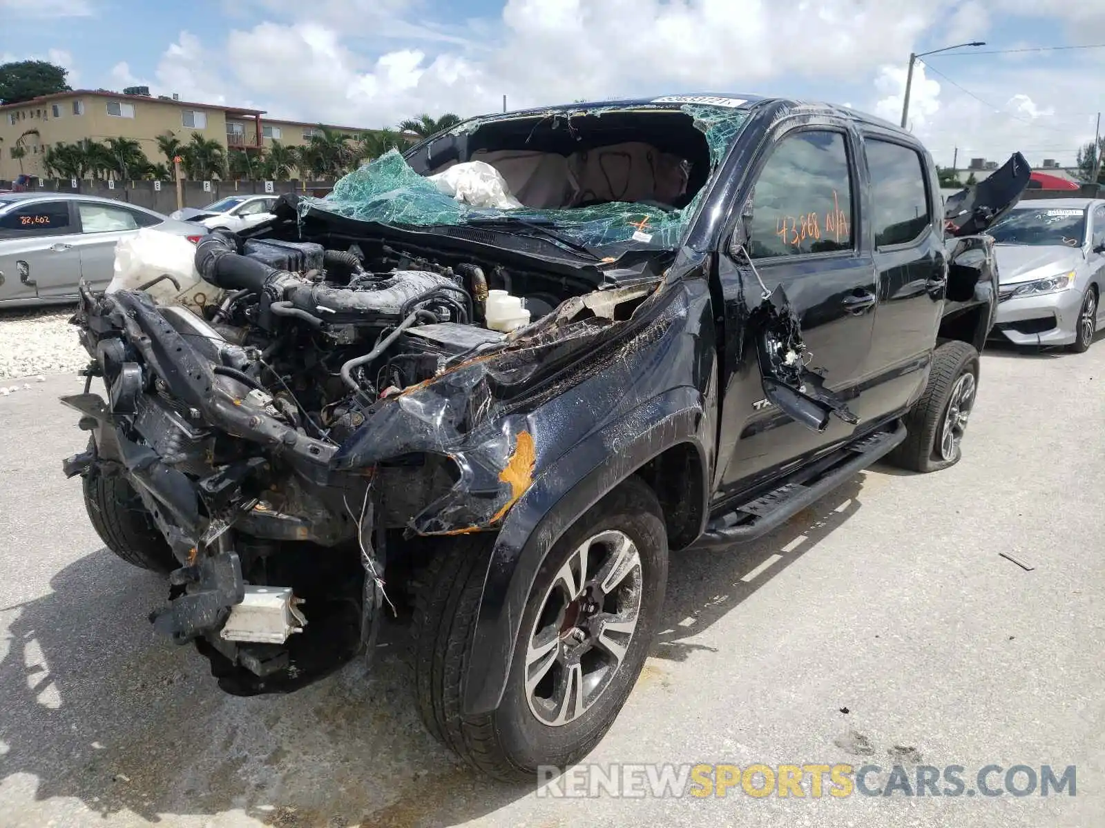 2 Photograph of a damaged car 3TMAZ5CN3KM111835 TOYOTA TACOMA 2019