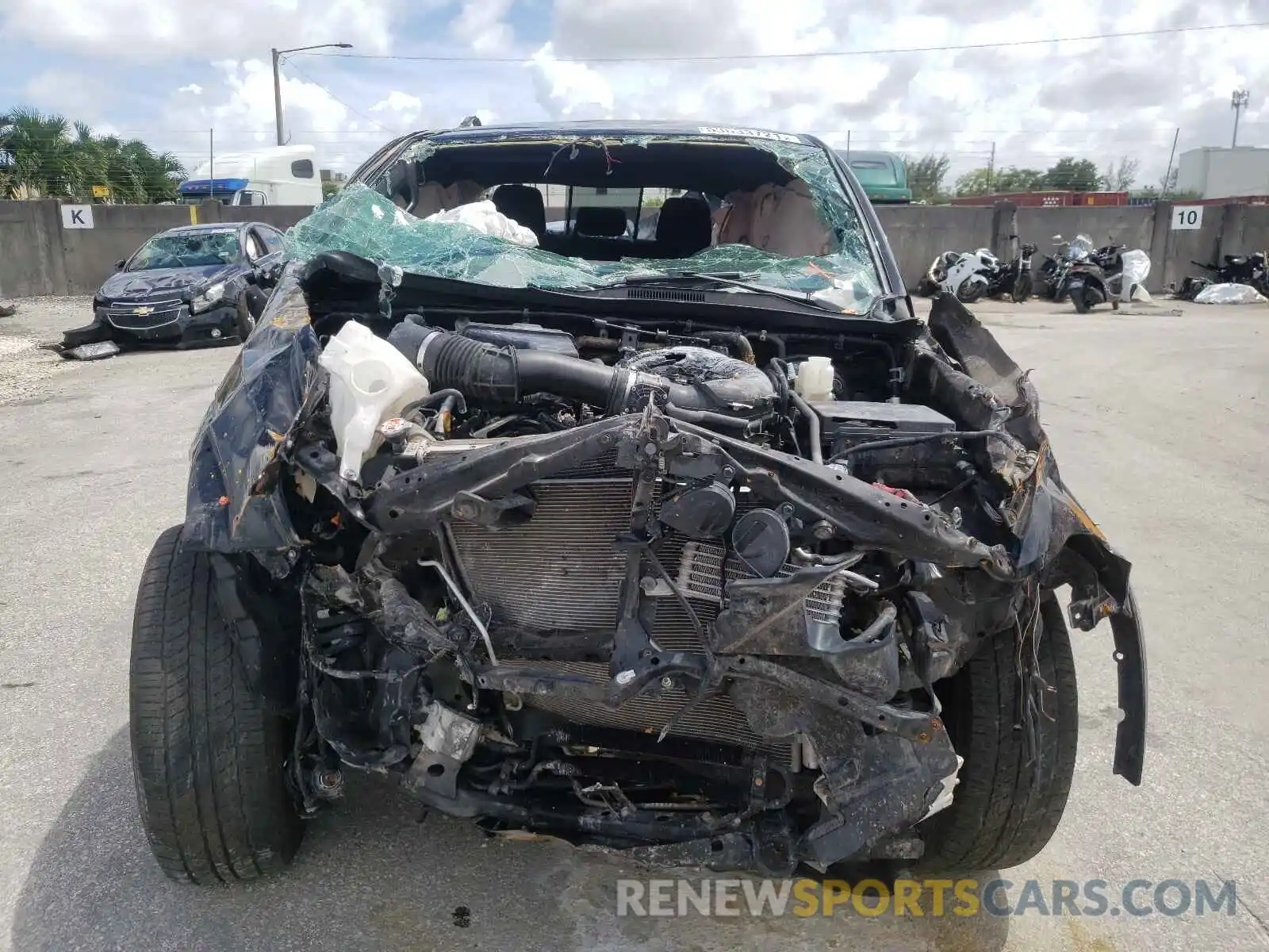 9 Photograph of a damaged car 3TMAZ5CN3KM111835 TOYOTA TACOMA 2019