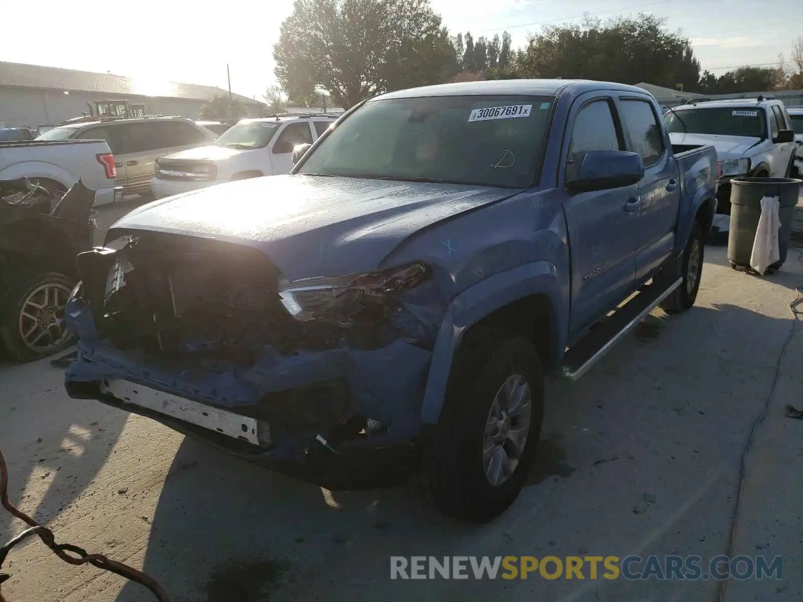 2 Photograph of a damaged car 3TMAZ5CN3KM112242 TOYOTA TACOMA 2019