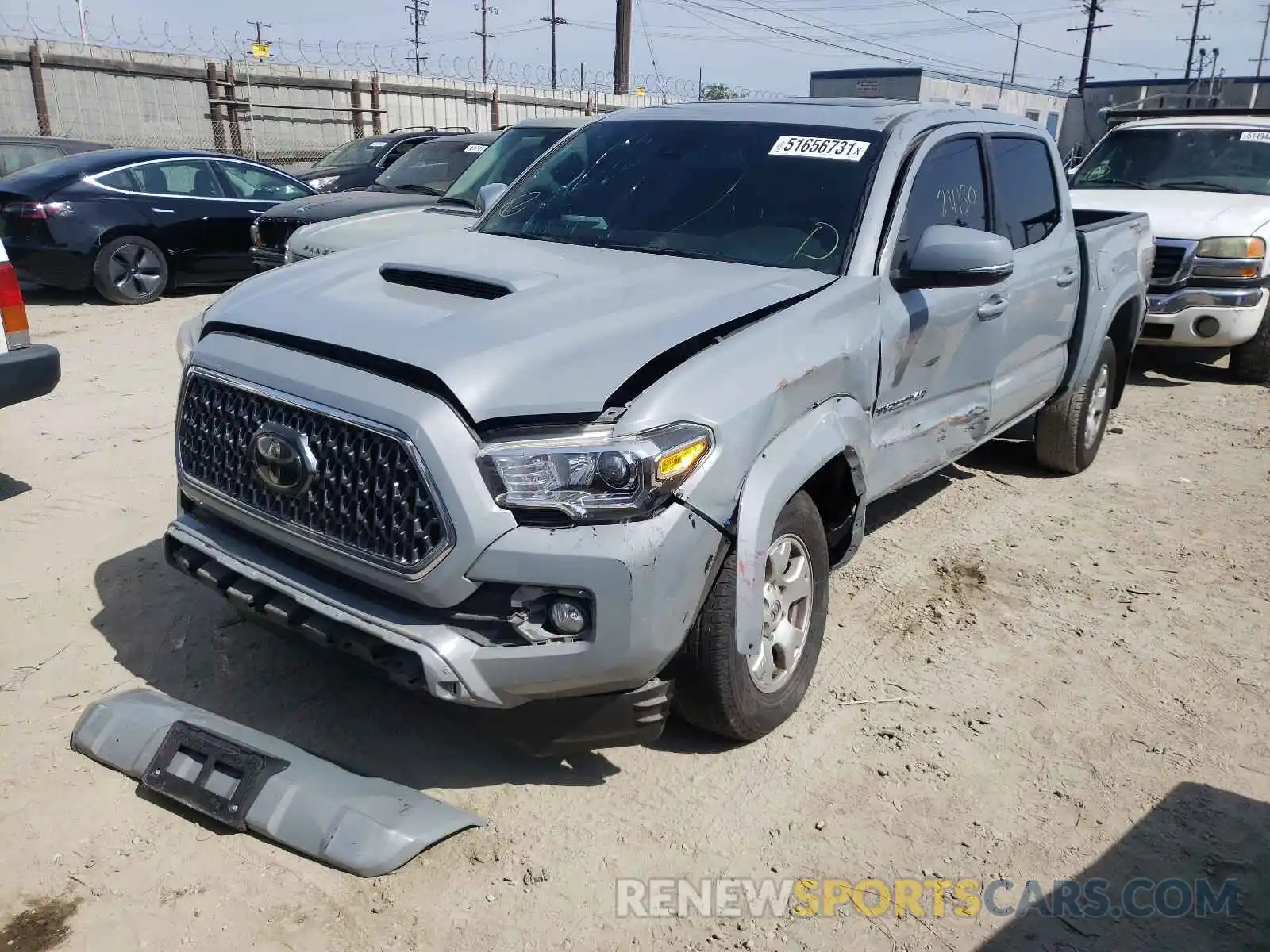 2 Photograph of a damaged car 3TMAZ5CN3KM112595 TOYOTA TACOMA 2019