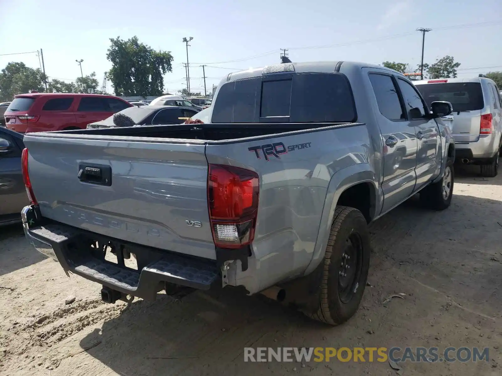 4 Photograph of a damaged car 3TMAZ5CN3KM112595 TOYOTA TACOMA 2019