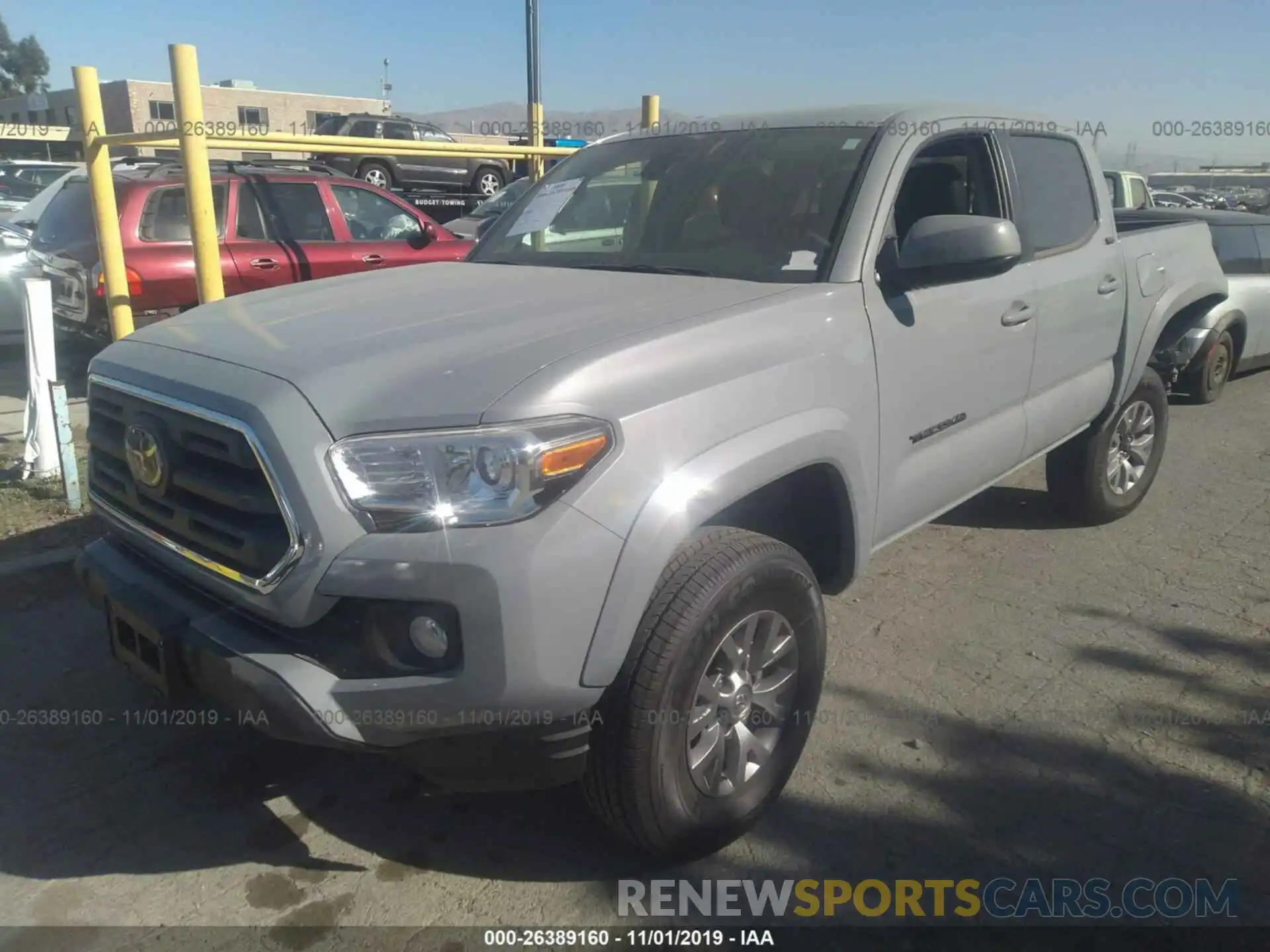 2 Photograph of a damaged car 3TMAZ5CN3KM112631 TOYOTA TACOMA 2019