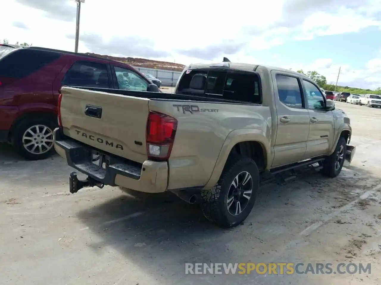 4 Photograph of a damaged car 3TMAZ5CN3KM112659 TOYOTA TACOMA 2019