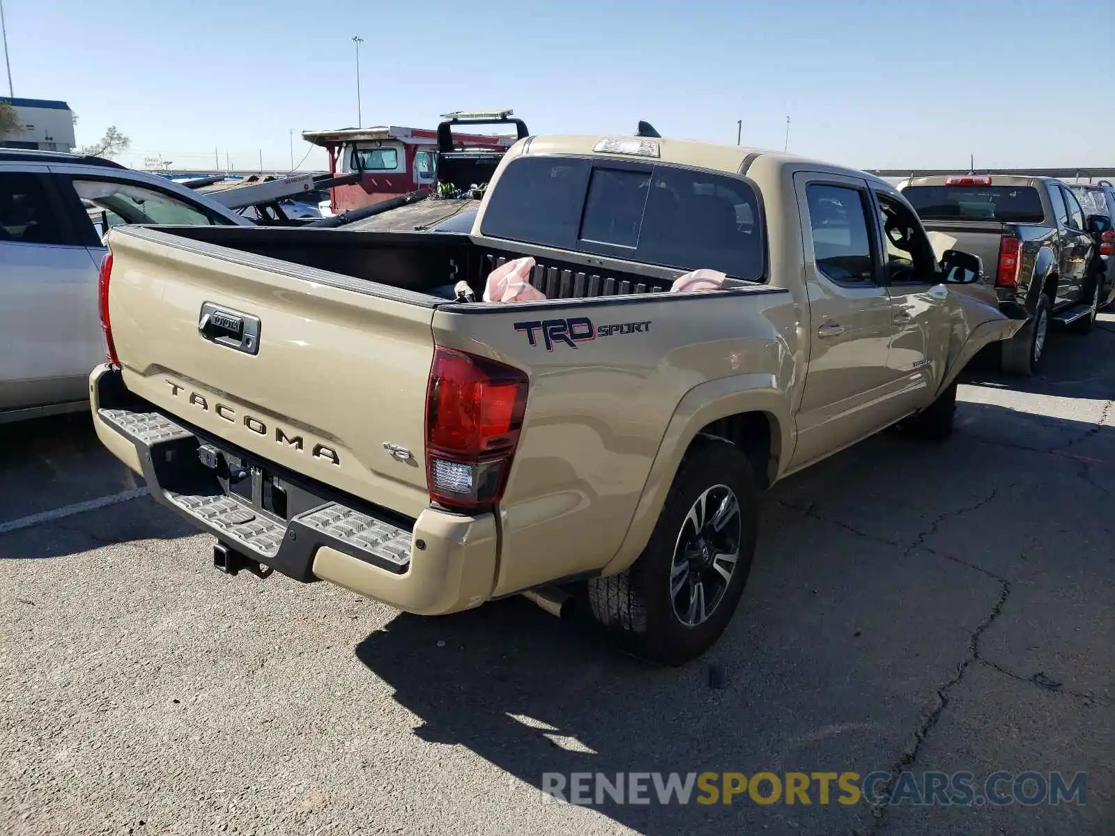 4 Photograph of a damaged car 3TMAZ5CN3KM114265 TOYOTA TACOMA 2019