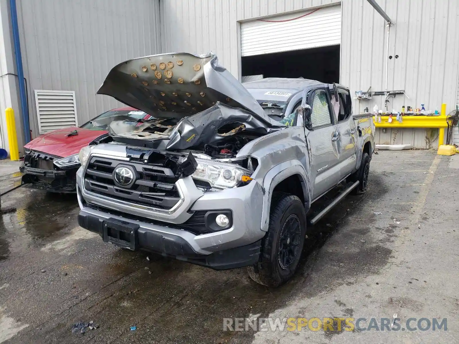 2 Photograph of a damaged car 3TMAZ5CN4KM079462 TOYOTA TACOMA 2019