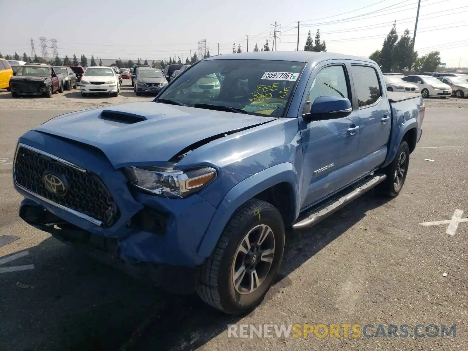 2 Photograph of a damaged car 3TMAZ5CN4KM079963 TOYOTA TACOMA 2019