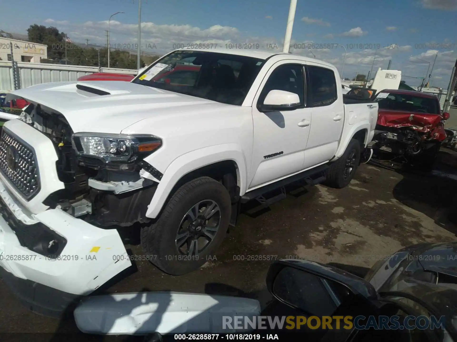 2 Photograph of a damaged car 3TMAZ5CN4KM080210 TOYOTA TACOMA 2019