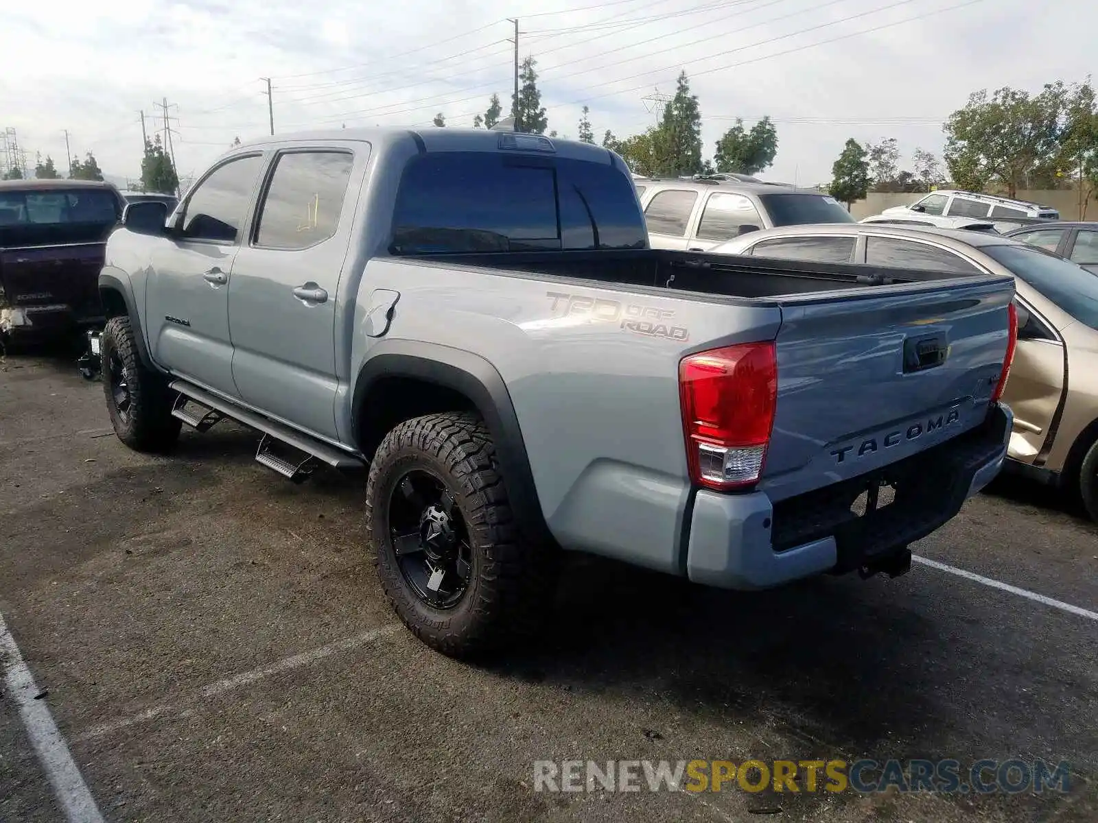 3 Photograph of a damaged car 3TMAZ5CN4KM083270 TOYOTA TACOMA 2019