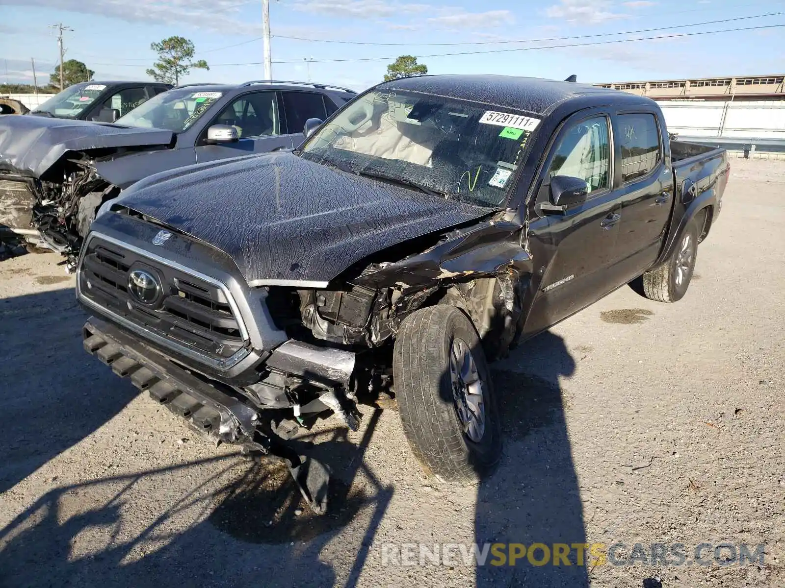 2 Photograph of a damaged car 3TMAZ5CN4KM085083 TOYOTA TACOMA 2019