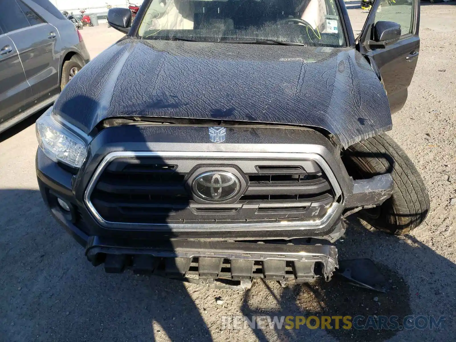 7 Photograph of a damaged car 3TMAZ5CN4KM085083 TOYOTA TACOMA 2019