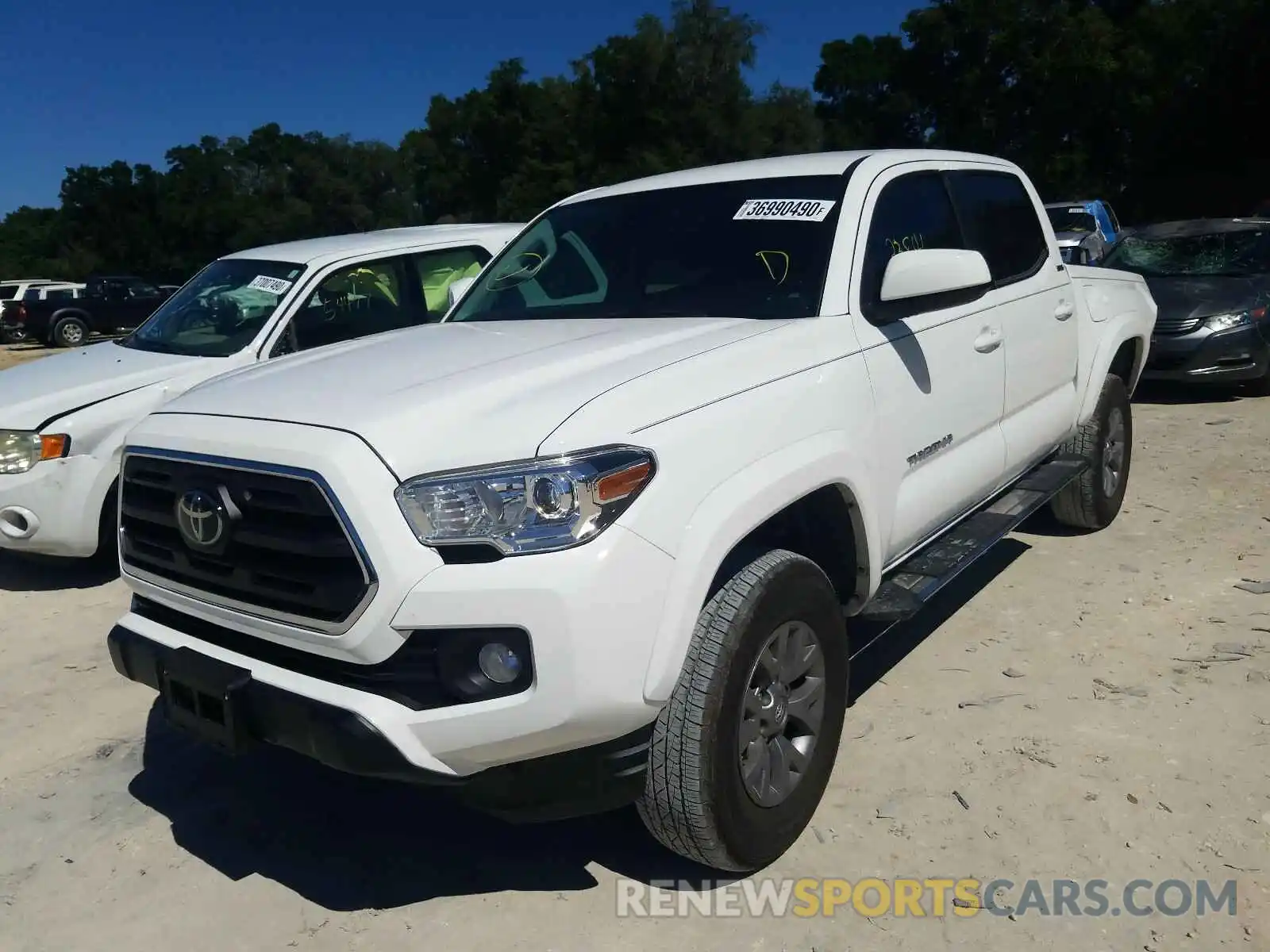 2 Photograph of a damaged car 3TMAZ5CN4KM086864 TOYOTA TACOMA 2019