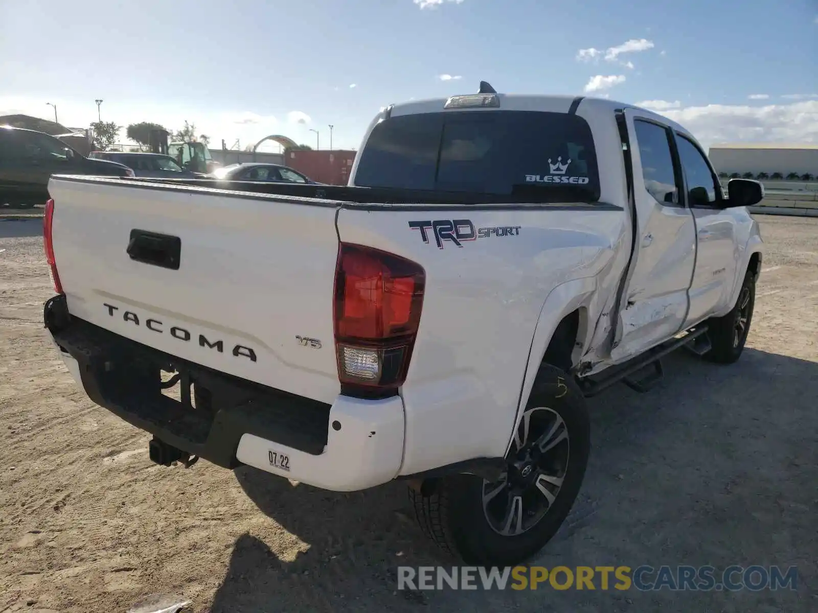 4 Photograph of a damaged car 3TMAZ5CN4KM087903 TOYOTA TACOMA 2019